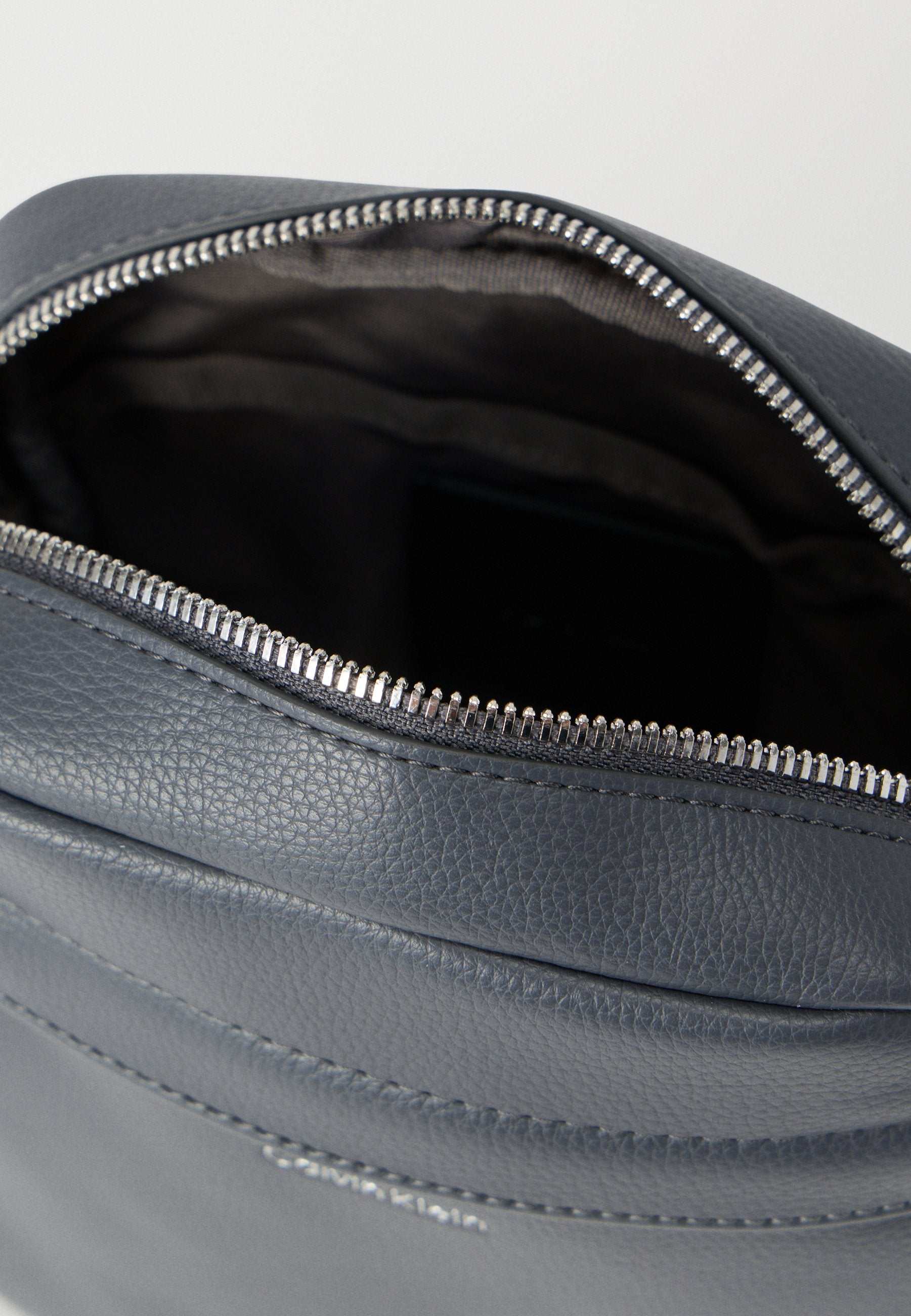 RAISED REPORTER - Cross body bag - iron gate