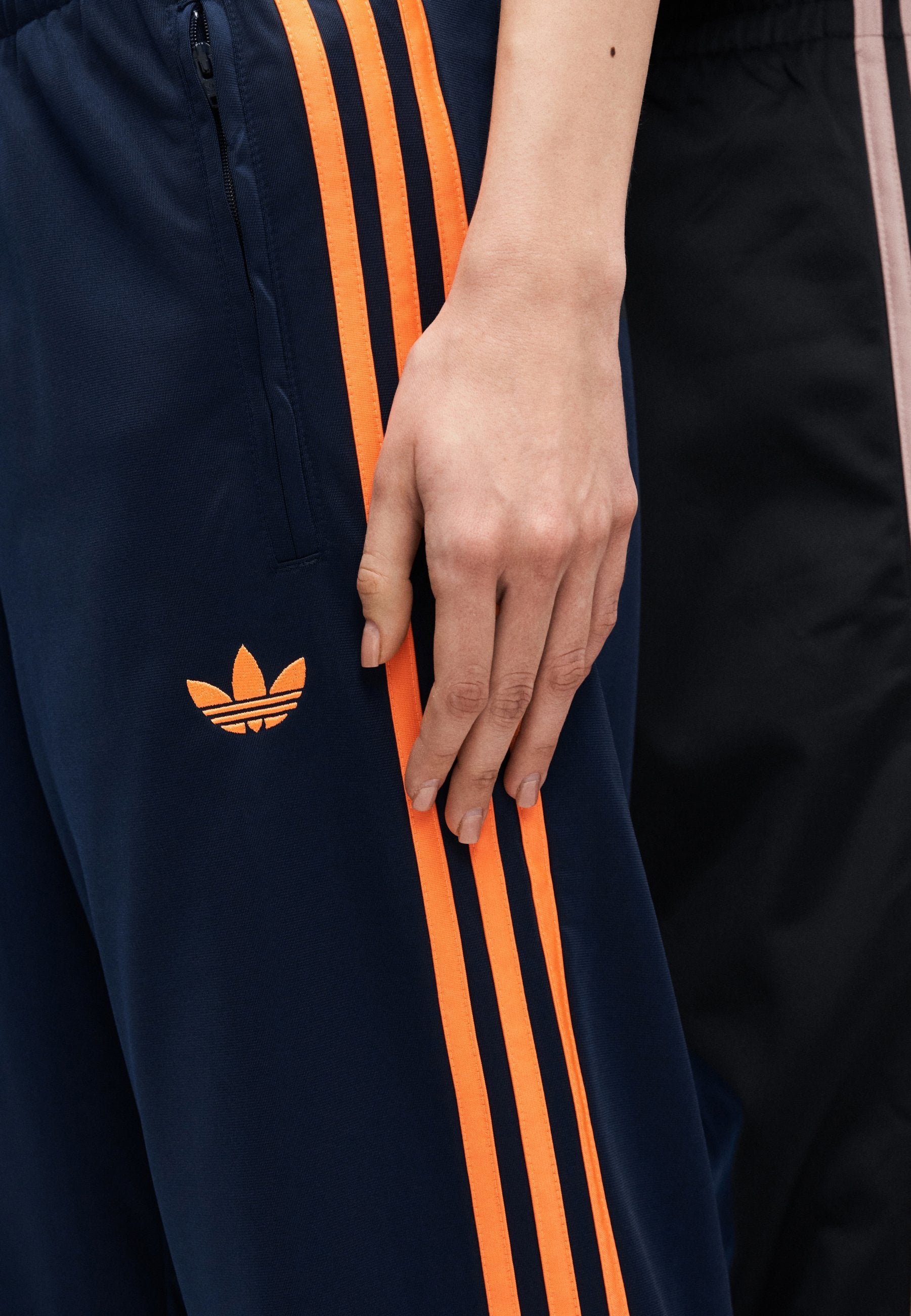 FIREBIRD TP - Tracksuit bottoms - night indigo/lucid orange