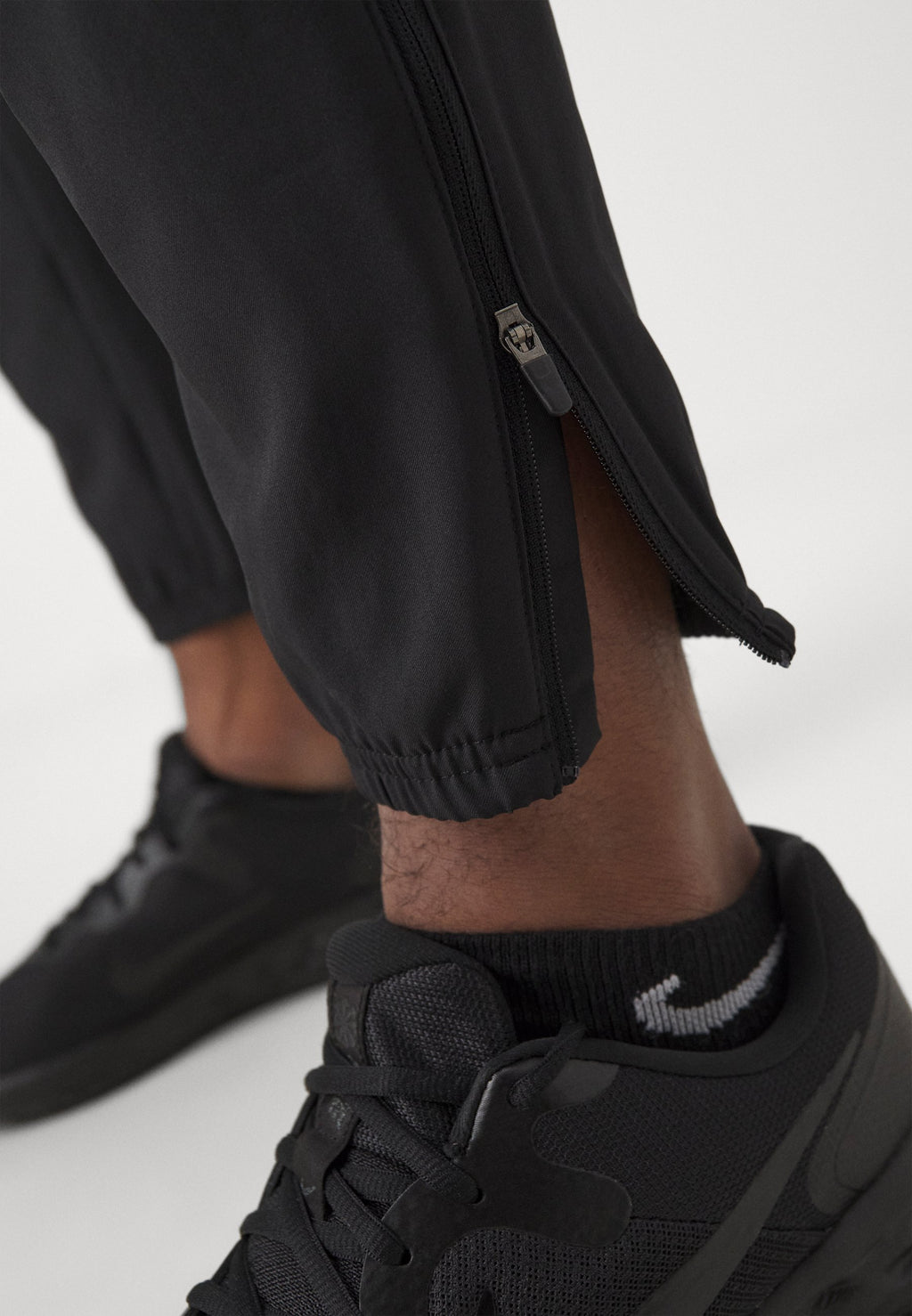 M NK DF CHALLENGR WVN PANT - Tracksuit bottoms - black/silver