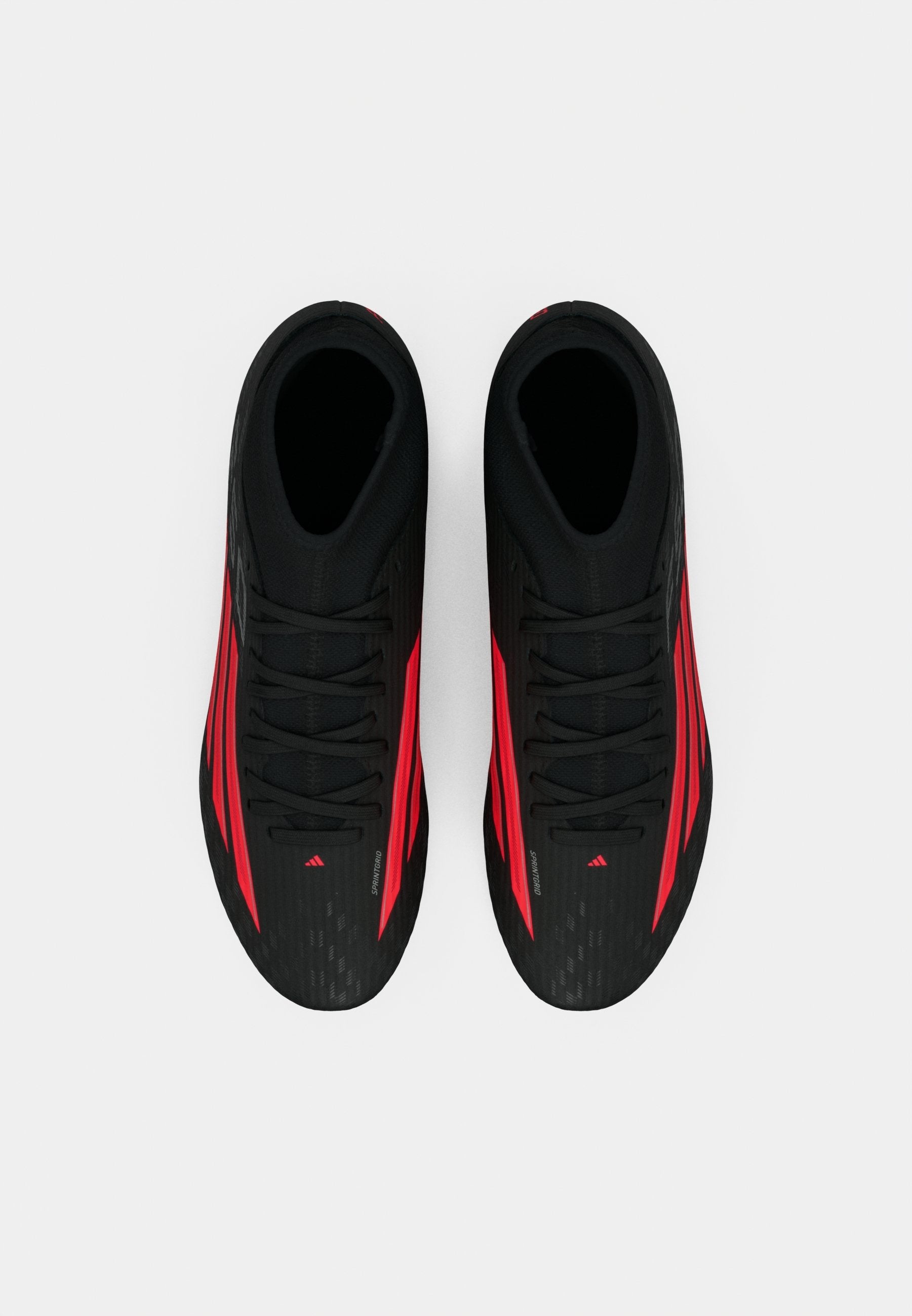 F50 CLUB MID CUT FIRM GROUND MULTI GROUND UNISEX - Football boots artificial grass - core black/lucid red