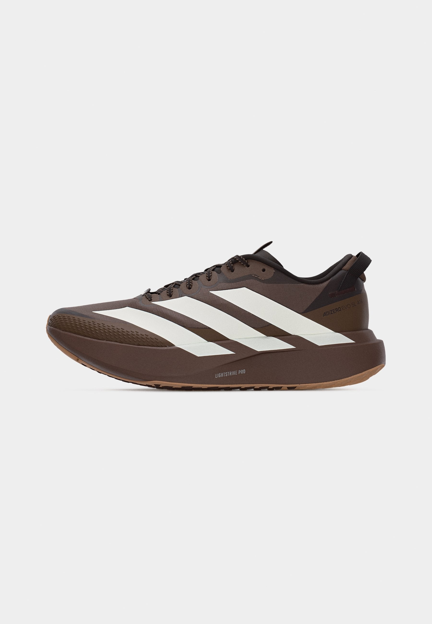 ADIZERO EVO SL ATR M - Trainers - earth strata/off white/warm sandstone