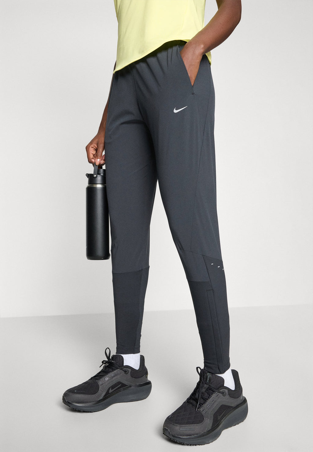 SWIFT - Tracksuit bottoms - black/reflective silver-coloured