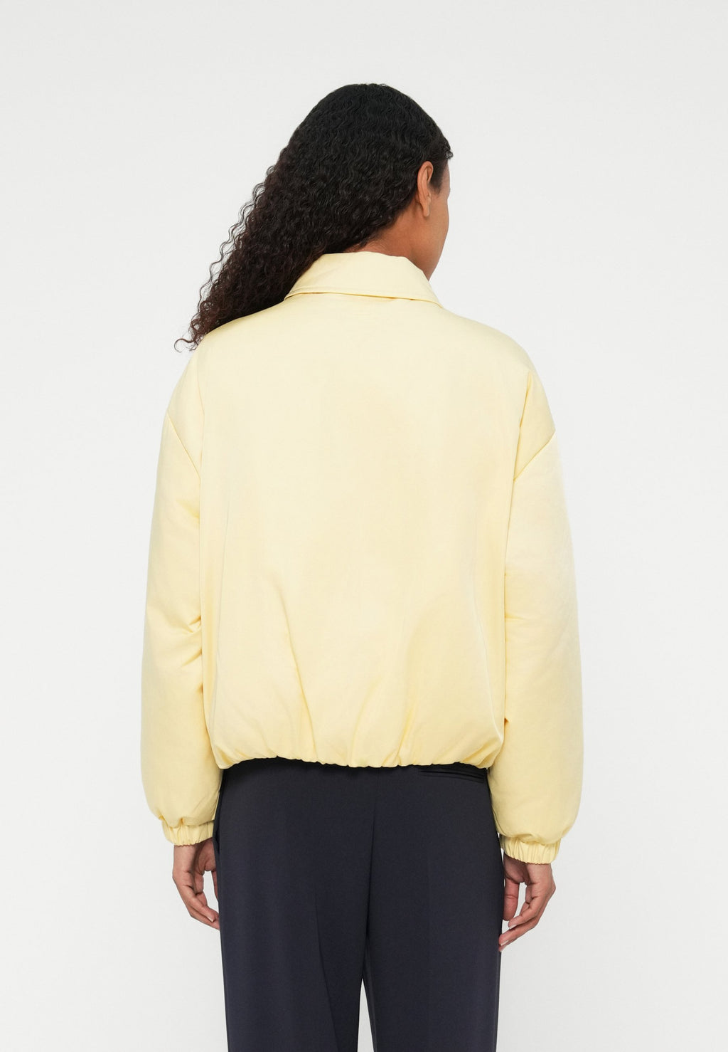 WATER REPELLENT SATIN RELAXED PADDED JACKET - Light jacket - zesty yellow