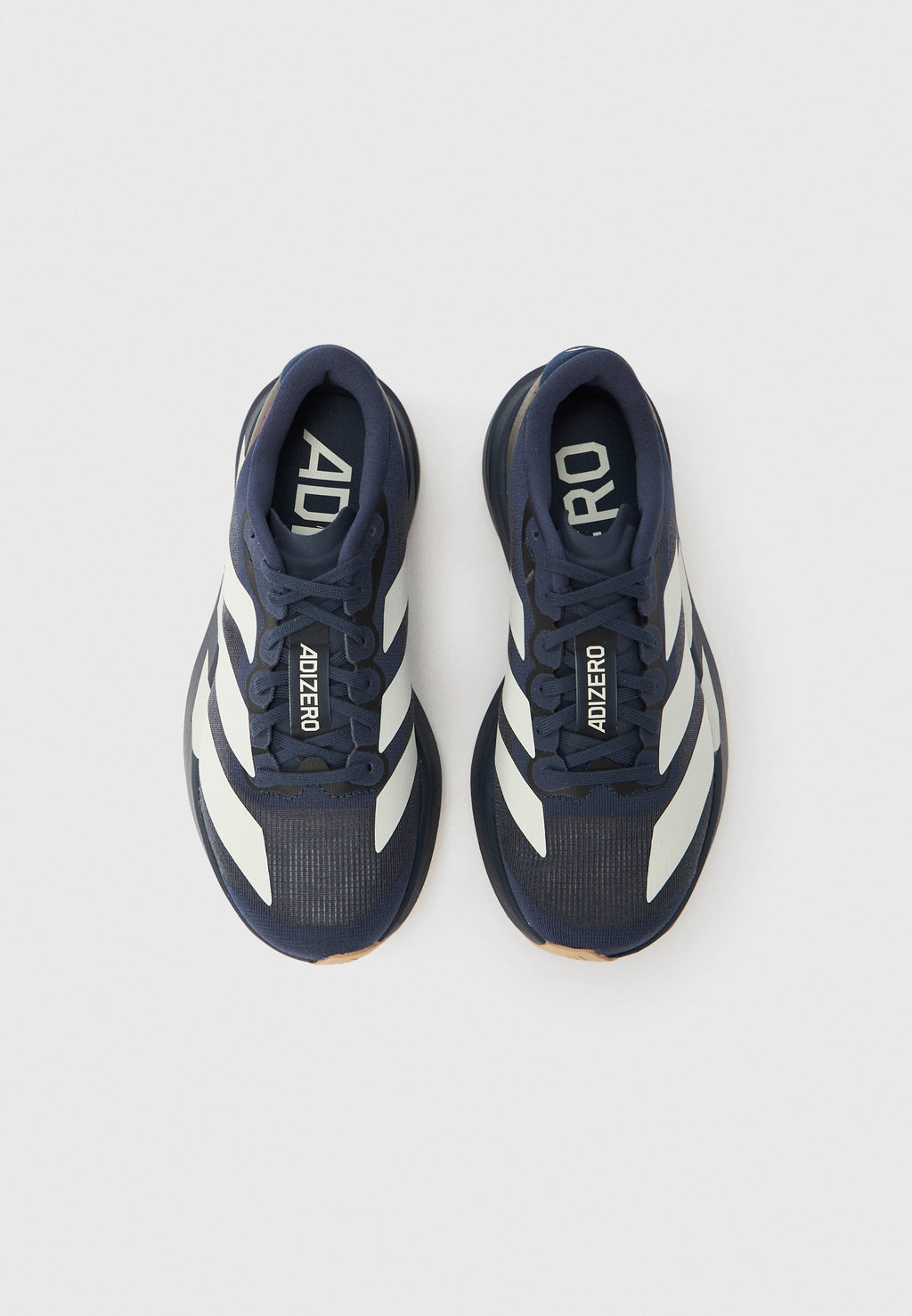 ADIZERO EVO SL J UNISEX - Road running shoes - shadow navy/white/warm sandstone