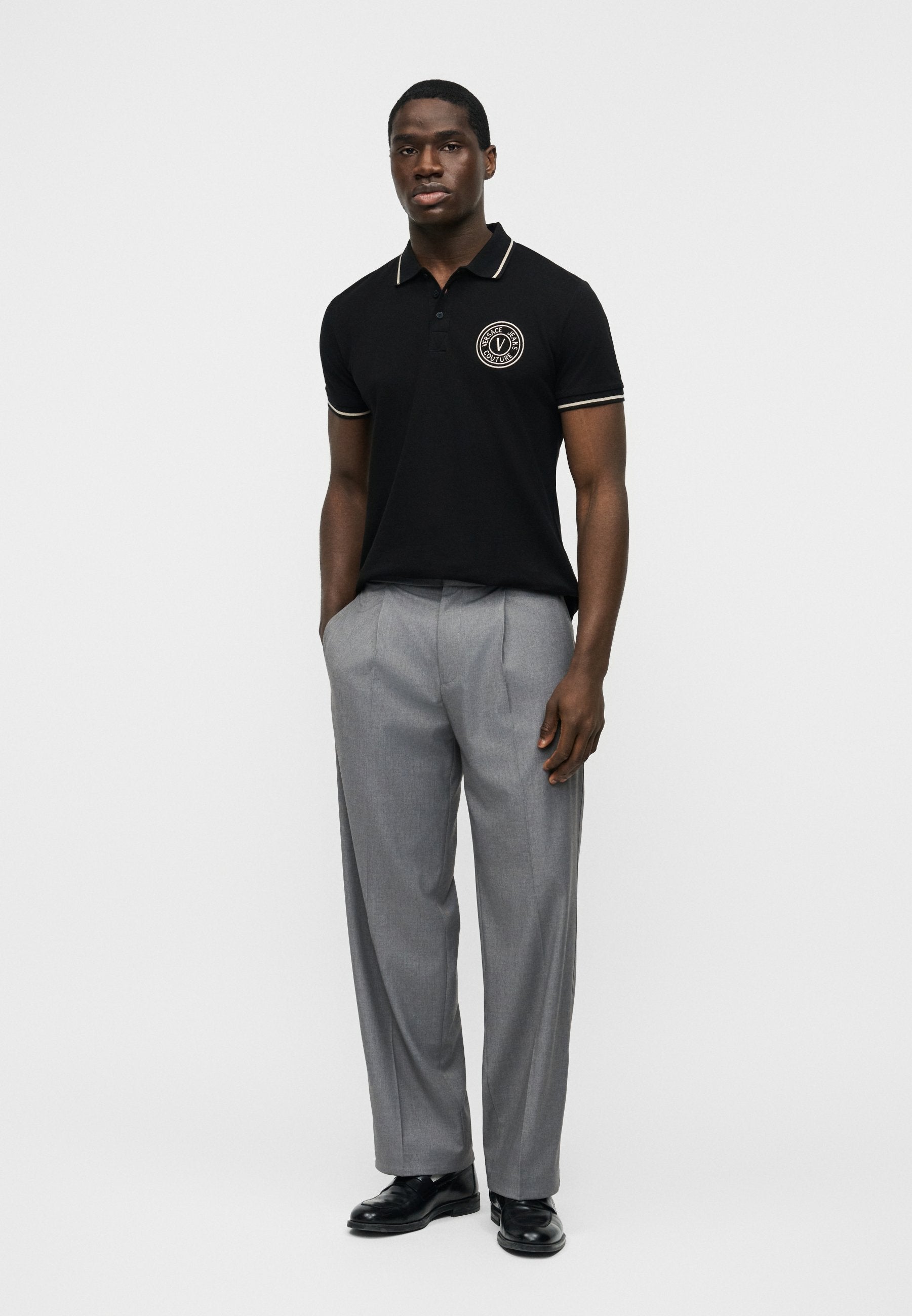 EMBLEM EMBRO - Polo shirt - black