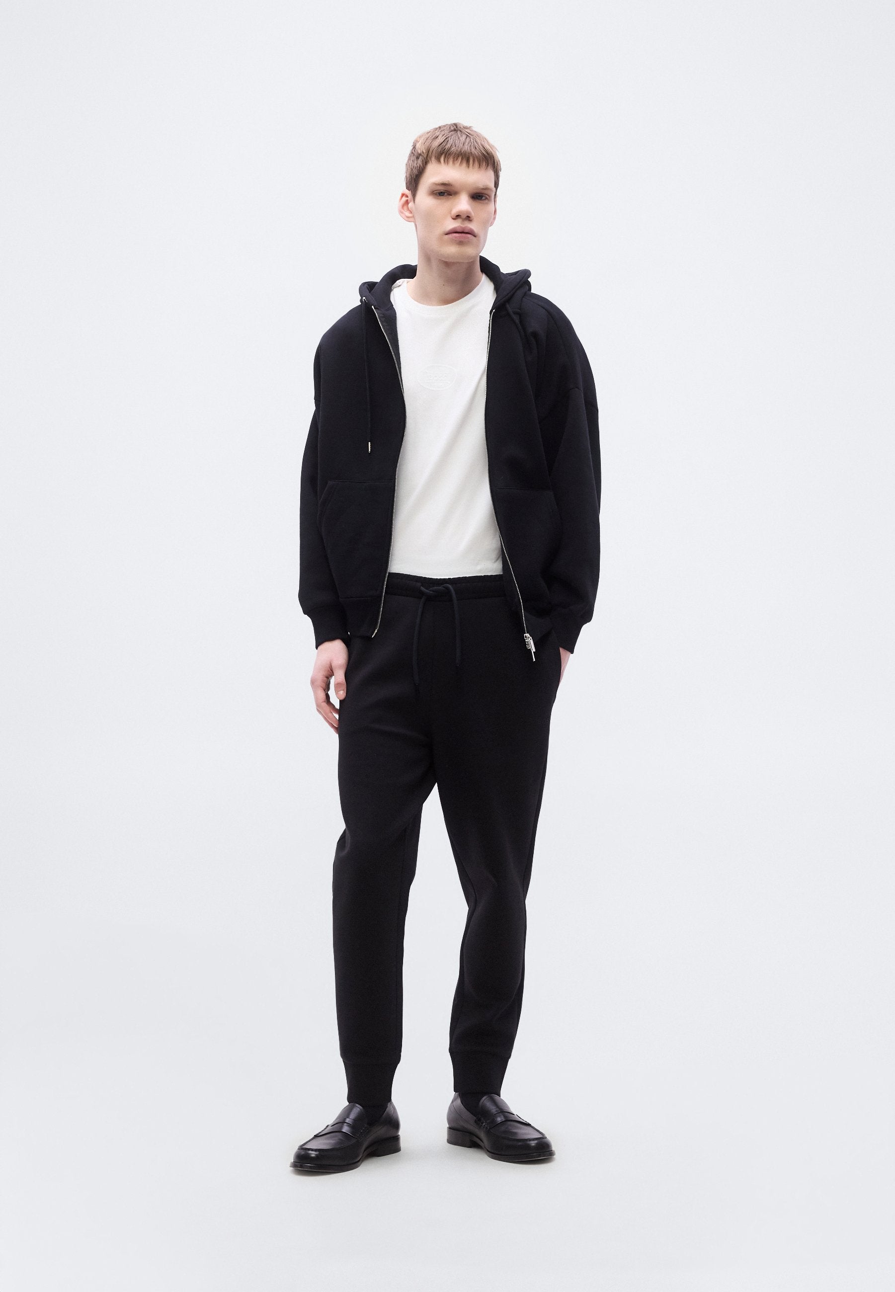 HADIKO - Tracksuit bottoms - black