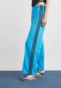 LOOSE - Tracksuit bottoms - blue
