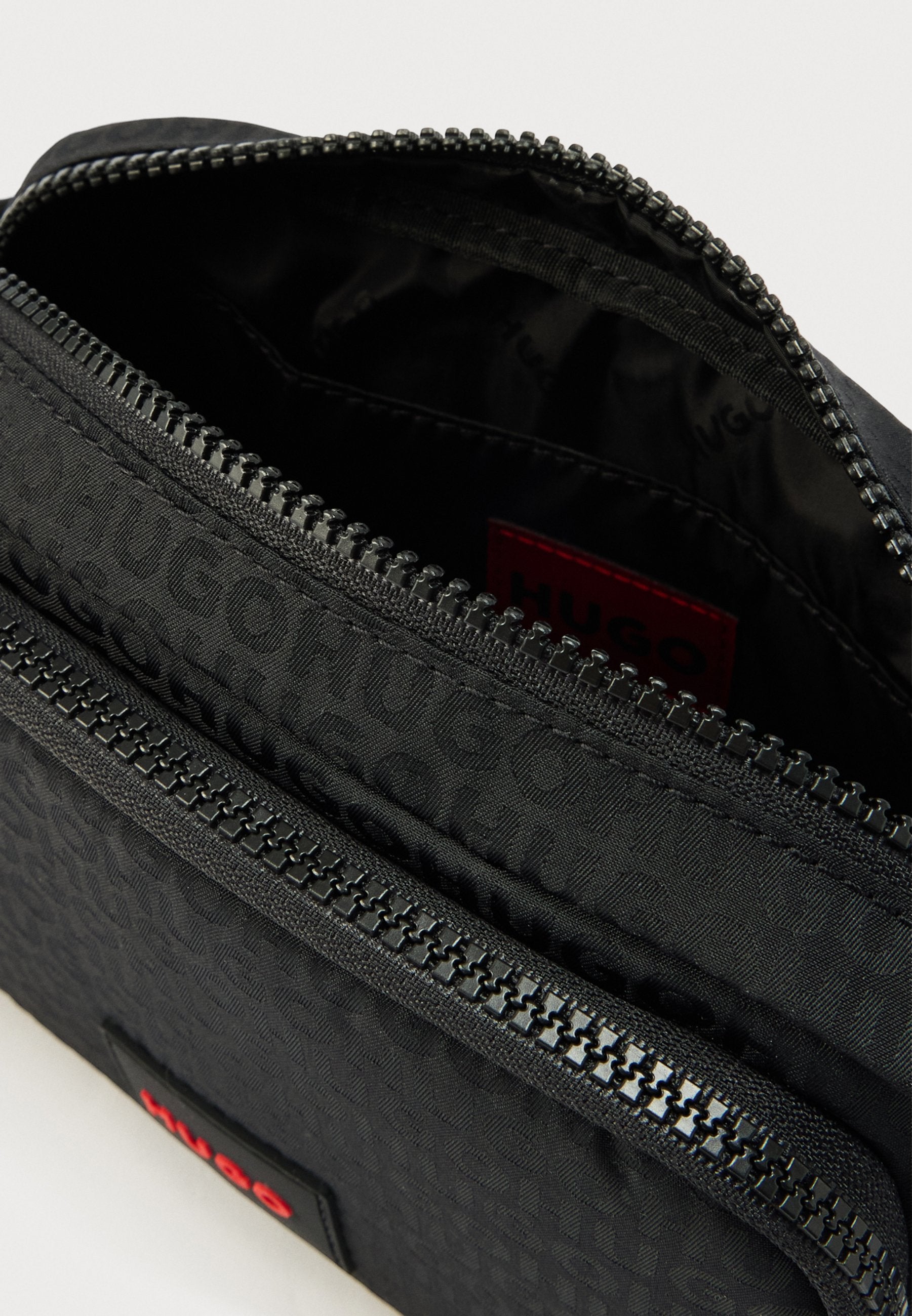 ETHON UNISEX - Cross body bag - black