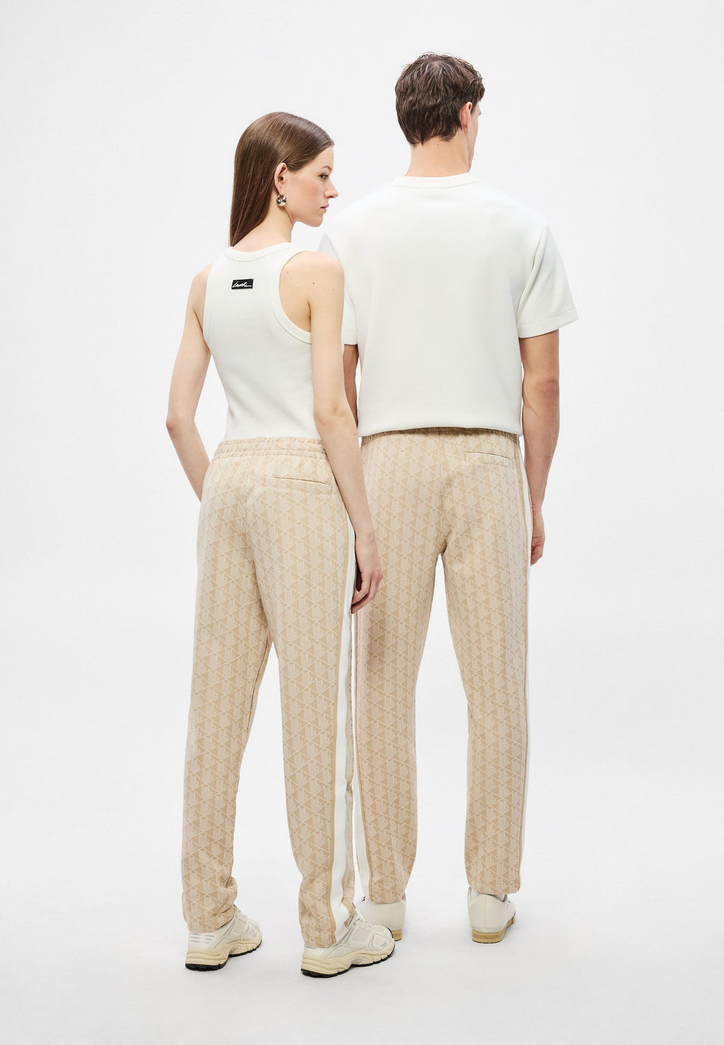 UNISEX - Tracksuit bottoms - lionne/flour