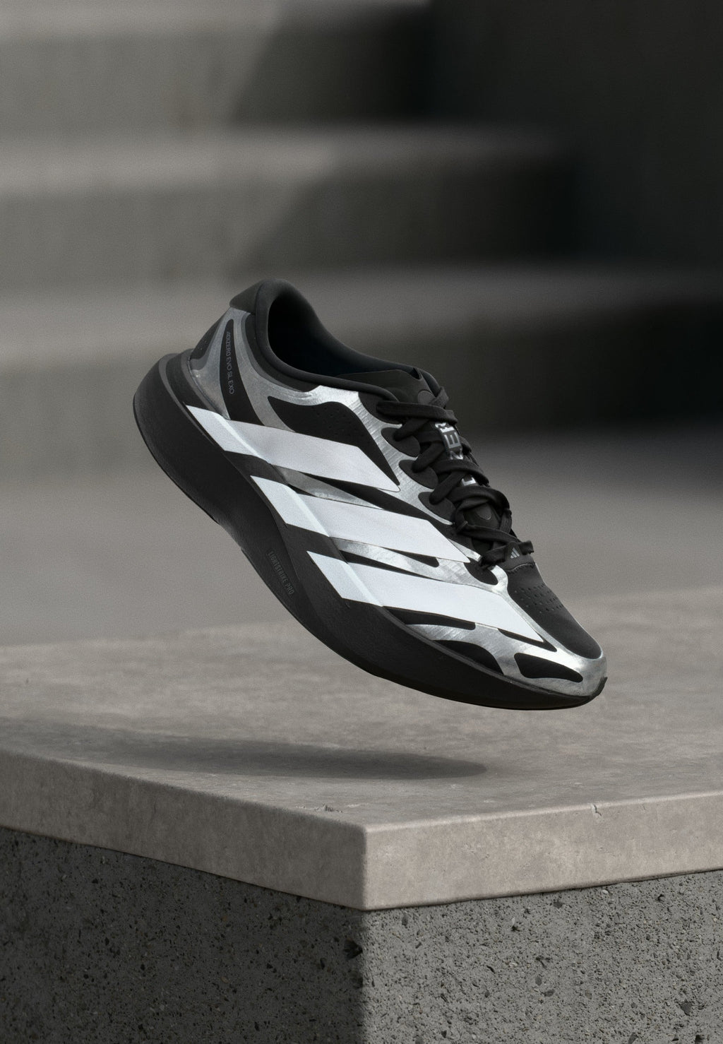 ADIZERO EVO SL EXO M - Trainers - core black/footwear white/iron metallic
