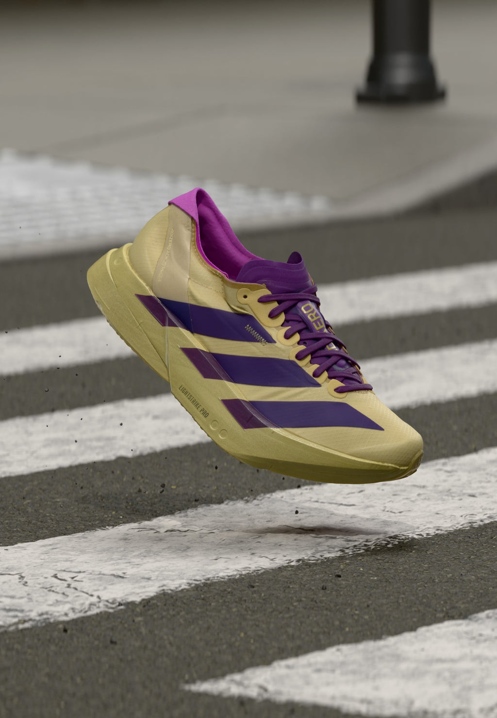 ADIZERO ADIOS PRO 4 - Road running shoes - sand/rich purple/gold-coloured metallic