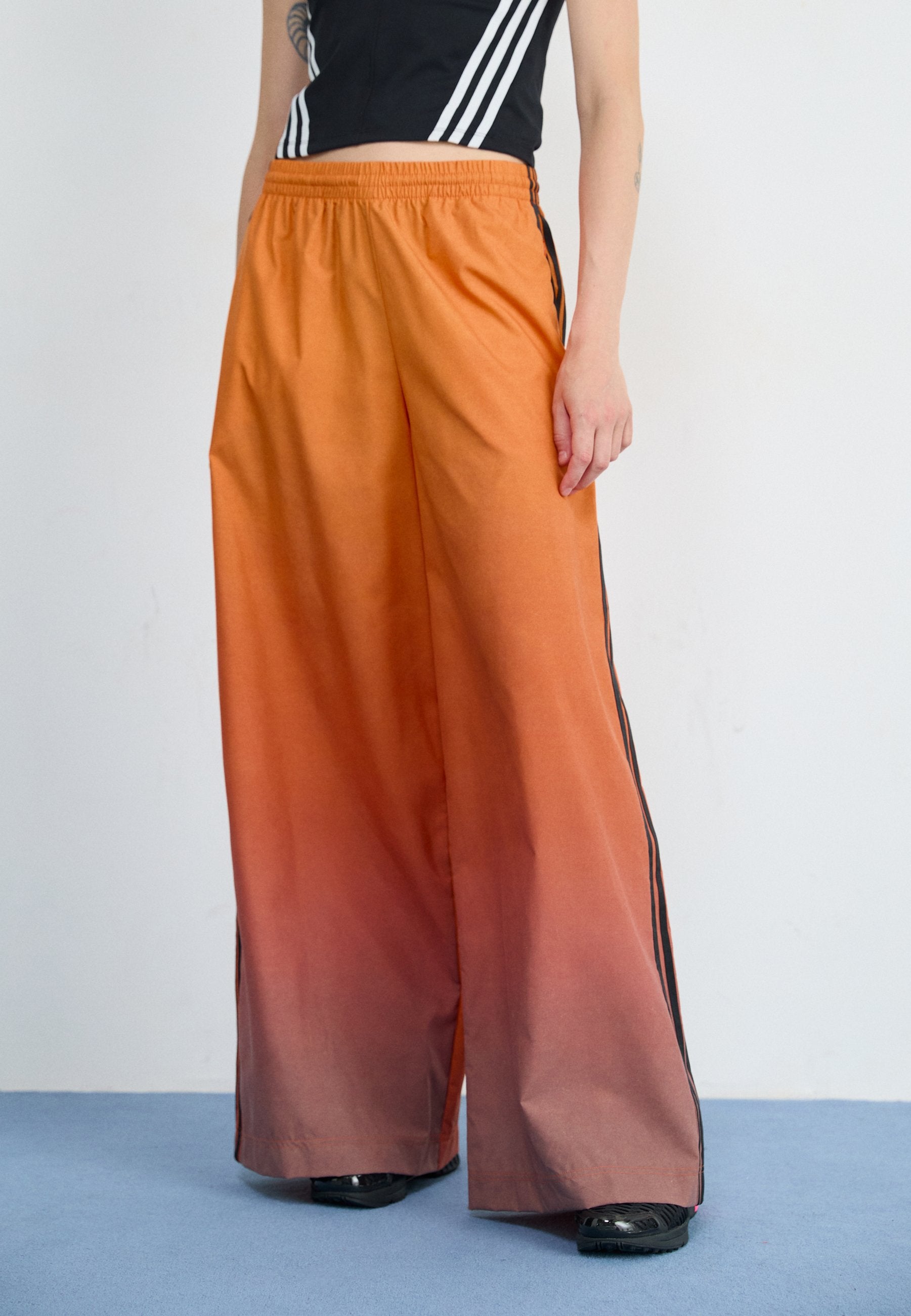 Tracksuit bottoms - multicolor/crew orange
