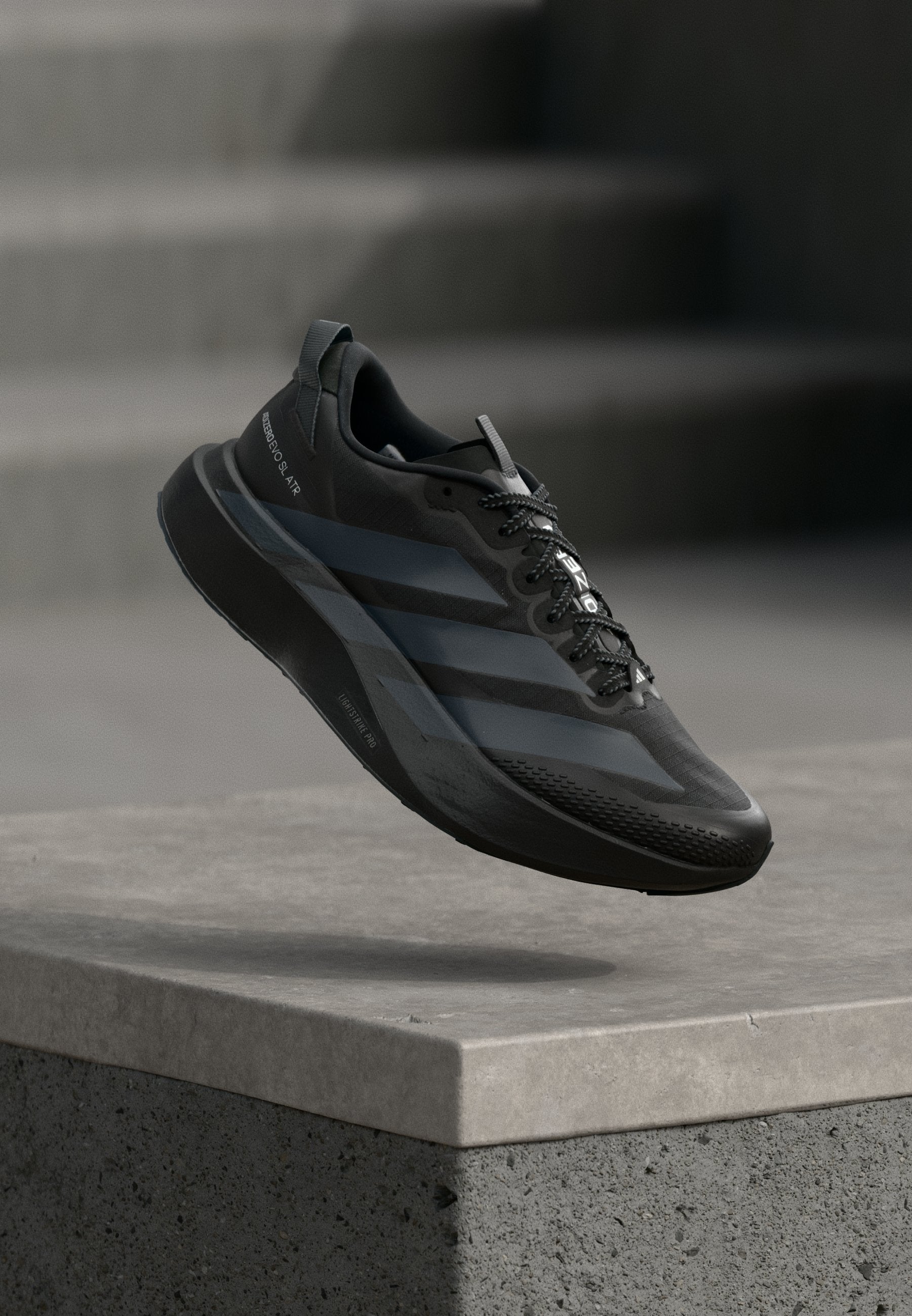 ADIZERO EVO SL ATR - Trainers - core black/grey five/silver-coloured metallic