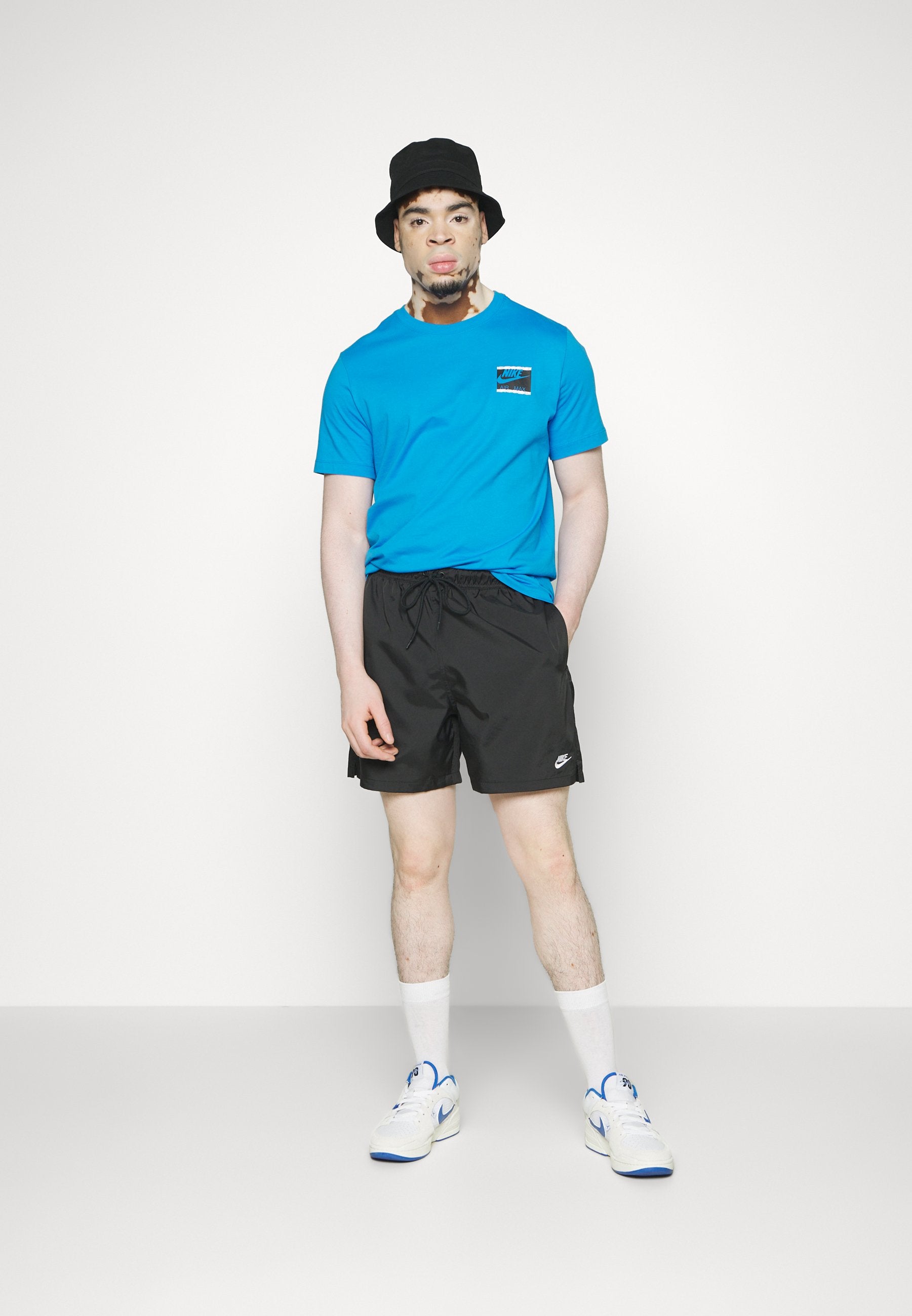M NK CLUB FLOW SHORT - Tracksuit bottoms - black/white