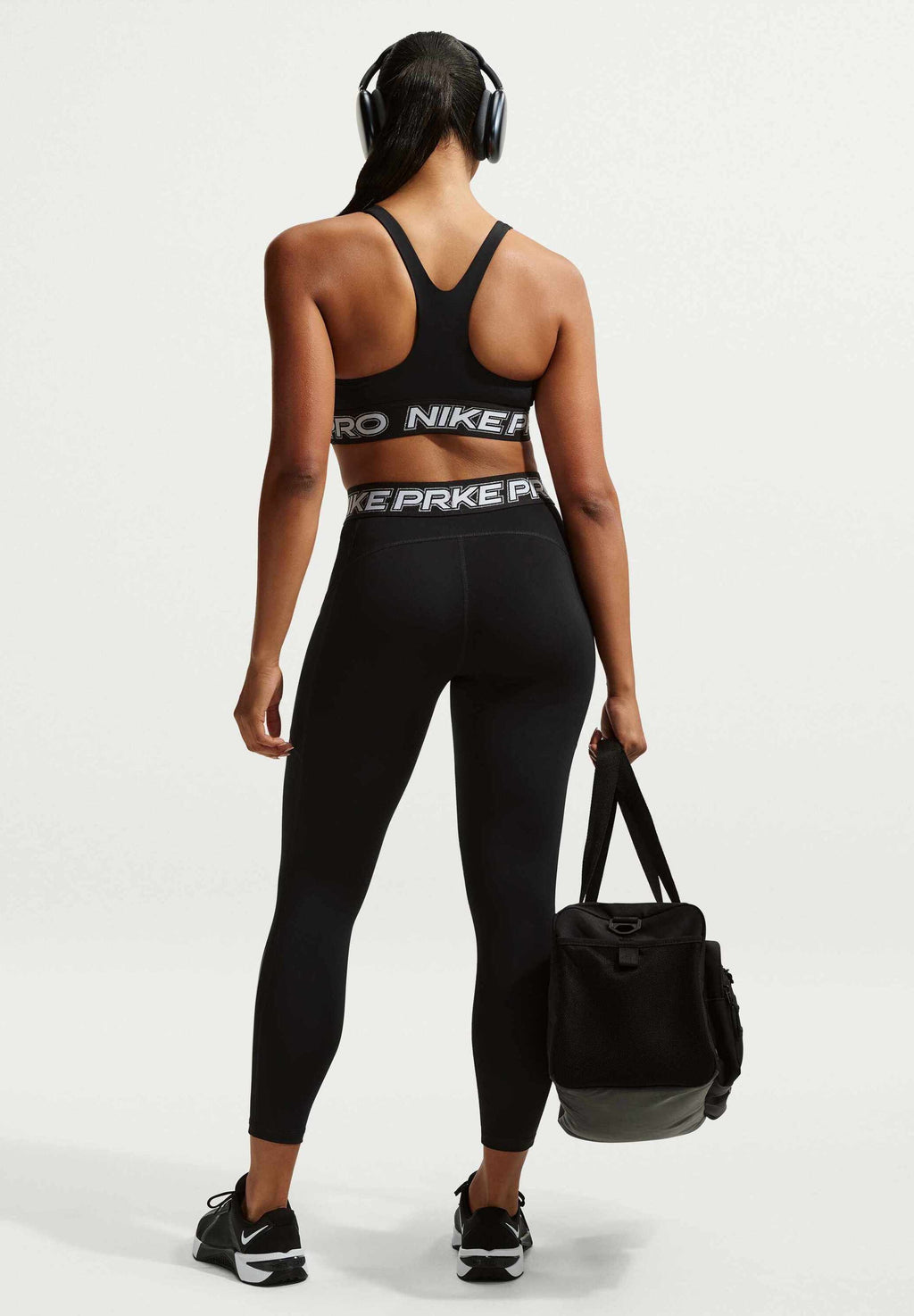 W NP DF BRA TT GRX - Medium support sports bra - black/white/metallic silver