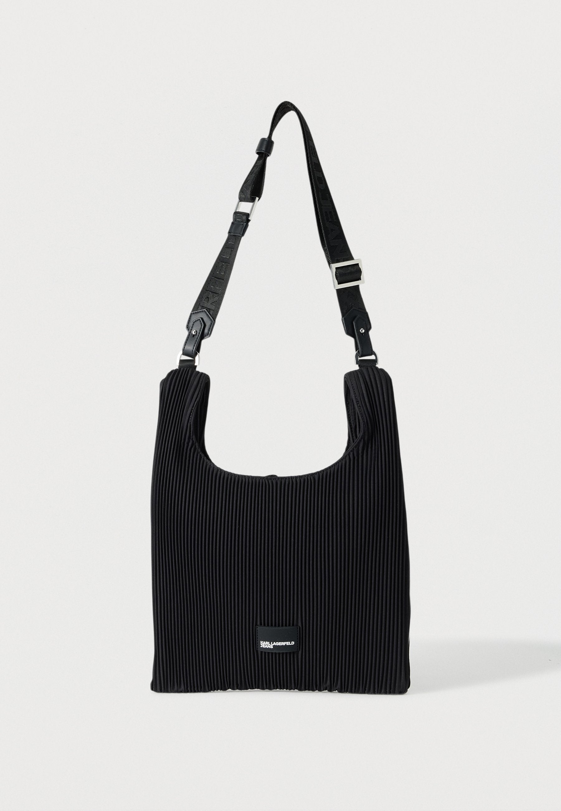 PLEAT - Cross body bag - black