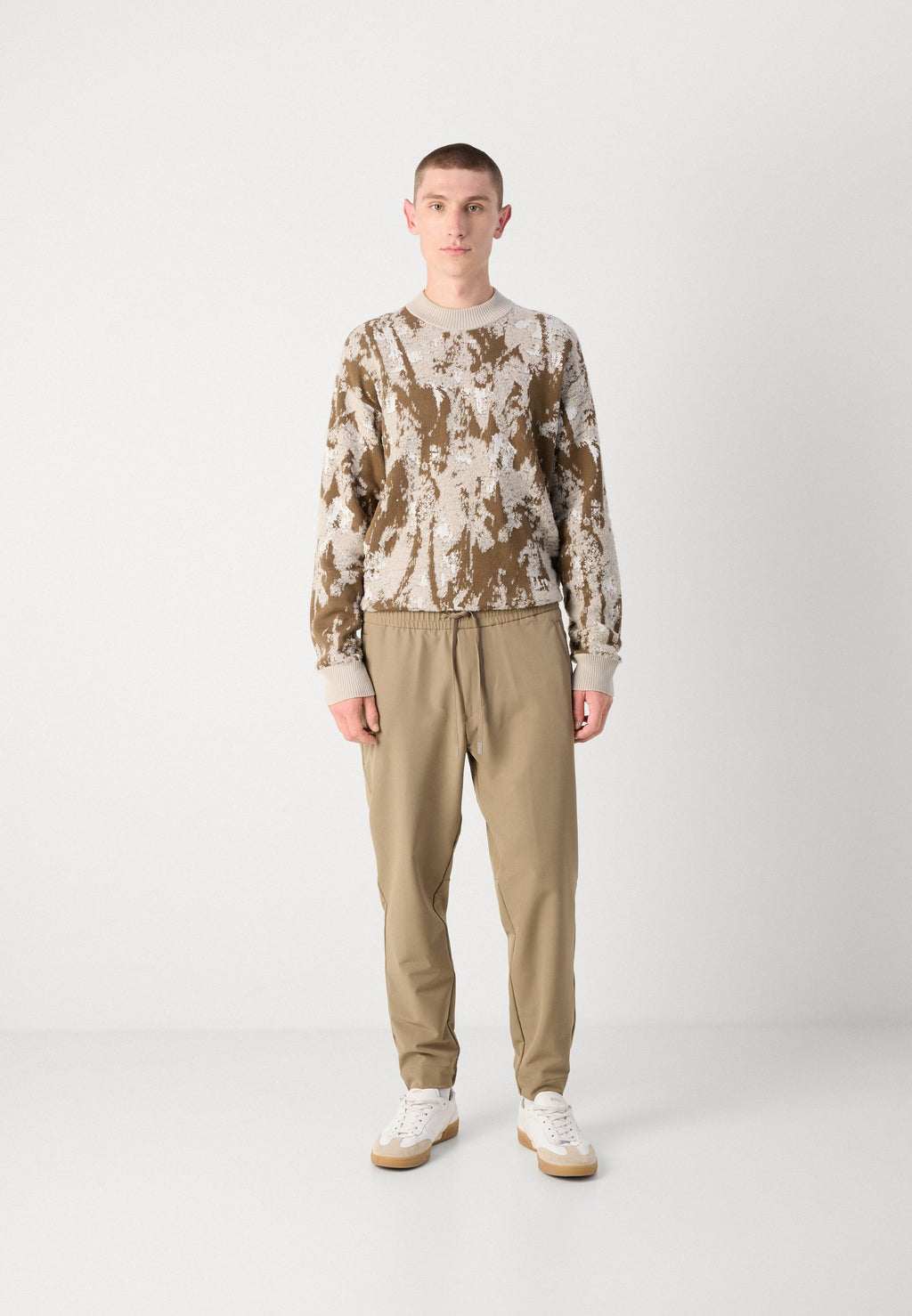 T_FLEX - Trousers - light/pastel green