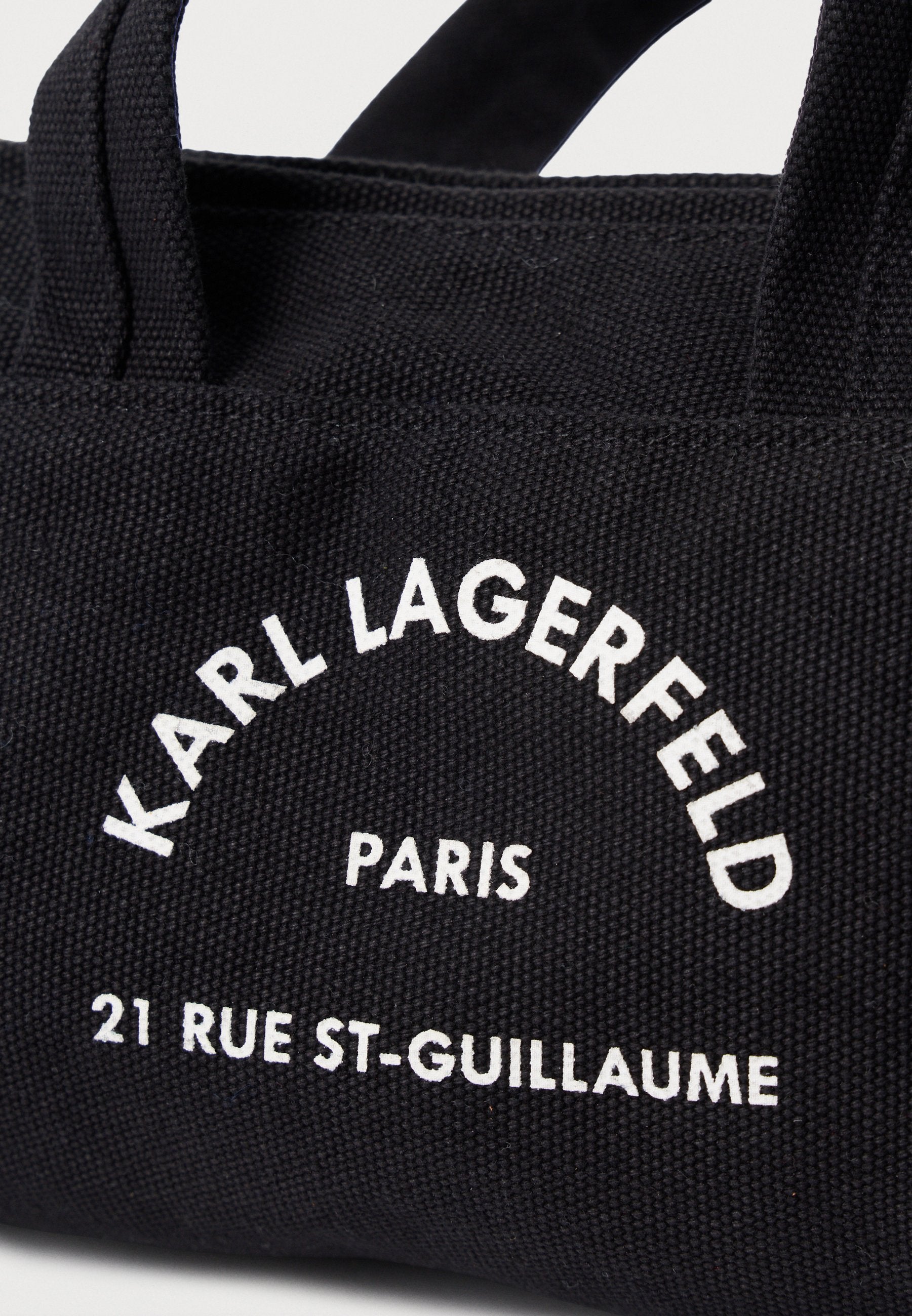 MINI DUFFLE - Handbag - black