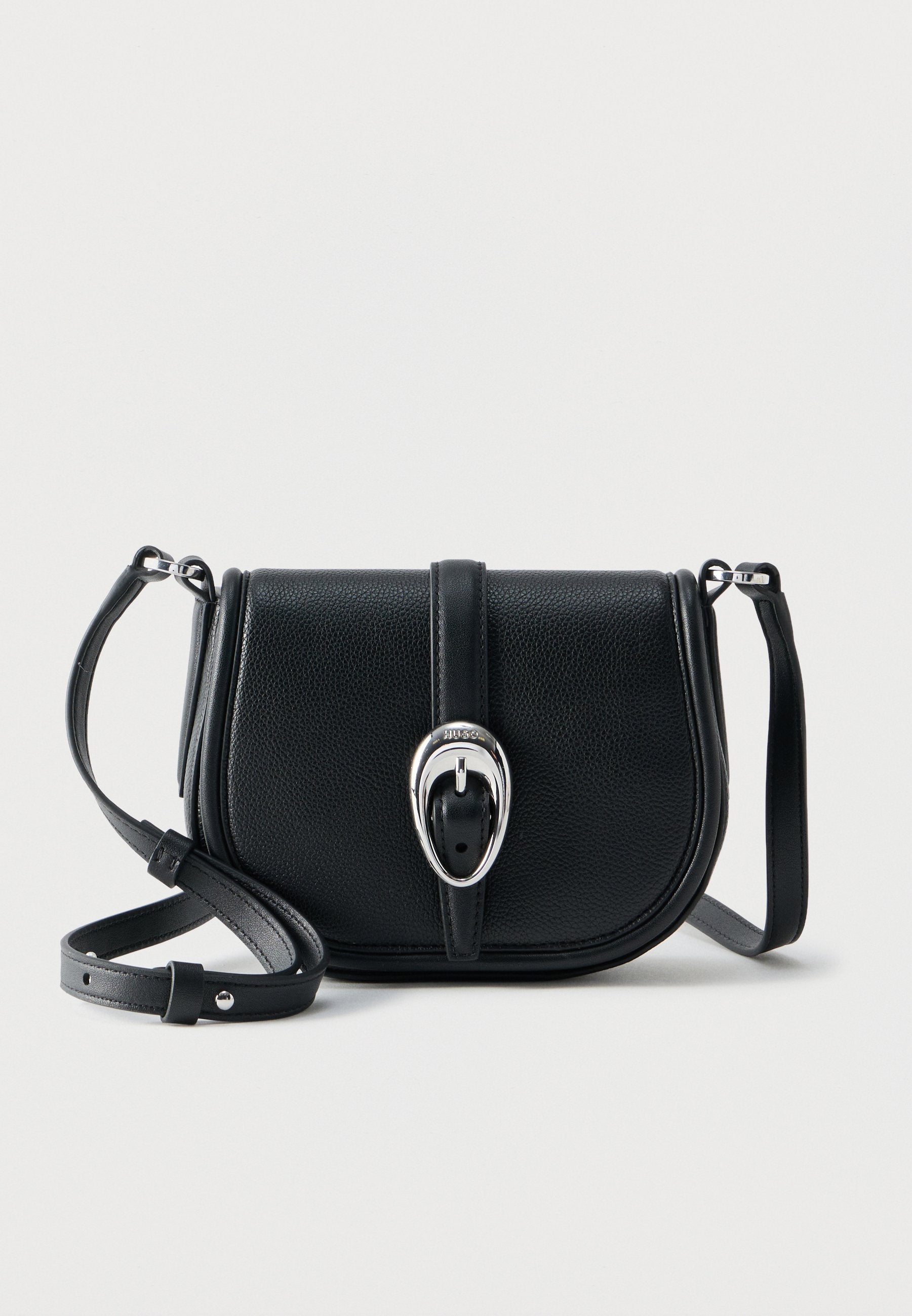JAINA SADDLE - Cross body bag - black