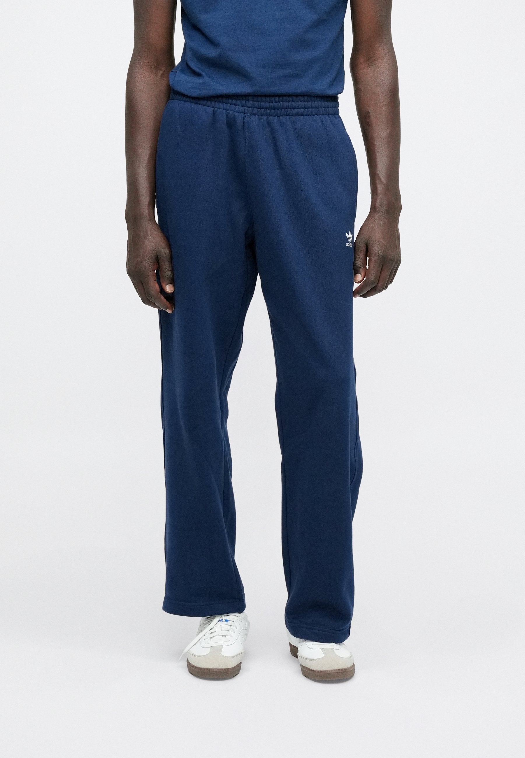 LOOSE UNISEX - Tracksuit bottoms - night indigo