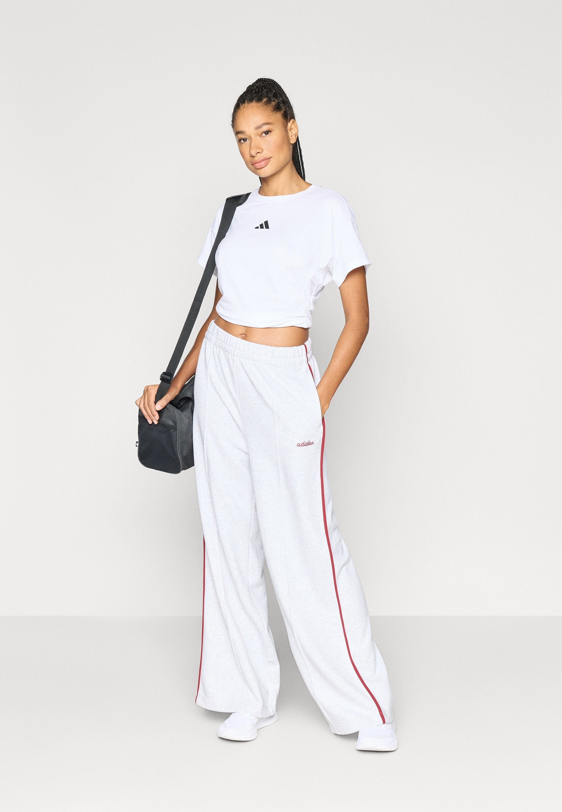 SEASONAL ESSENTIALS COLORPOP WITH EMBROIDERED GRAPHIC - Tracksuit bottoms - light grey heather/active maroon