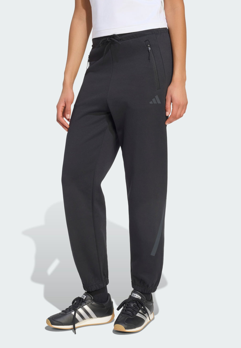 ADIDAS Z.N.E. PANTS - Tracksuit bottoms - black