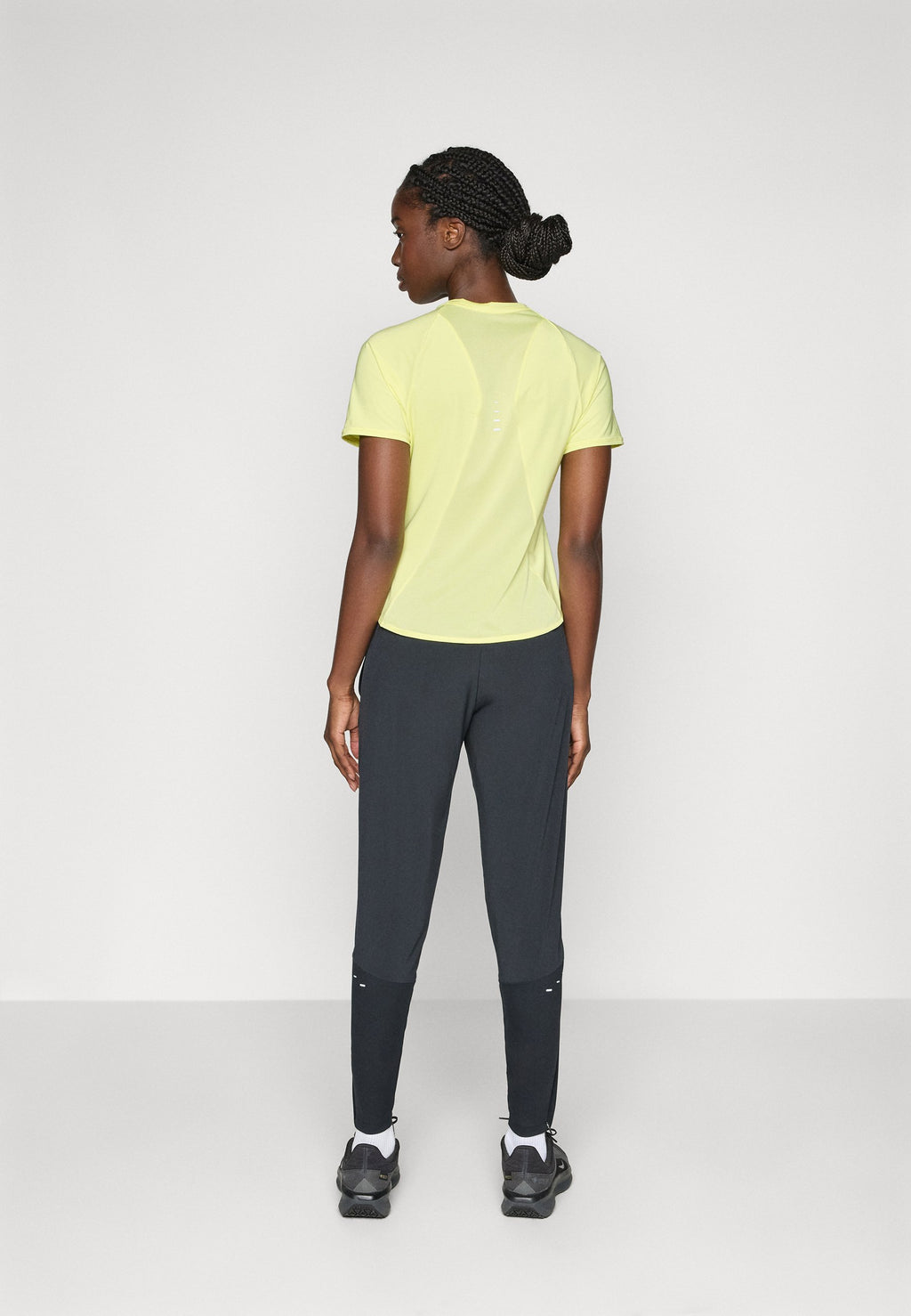 SWIFT - Tracksuit bottoms - black/reflective silver-coloured