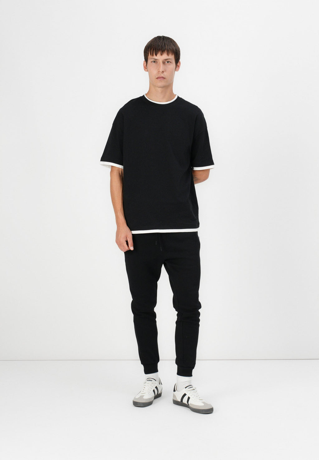 Regular Fit - Tracksuit bottoms - black