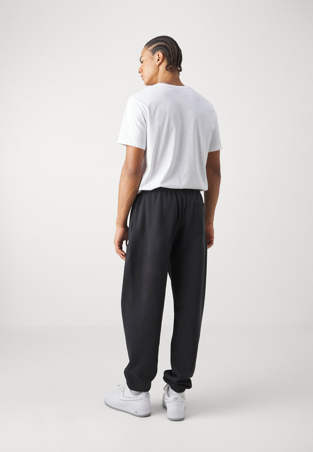 SPORT ESSENTIALS  - Tracksuit bottoms - black