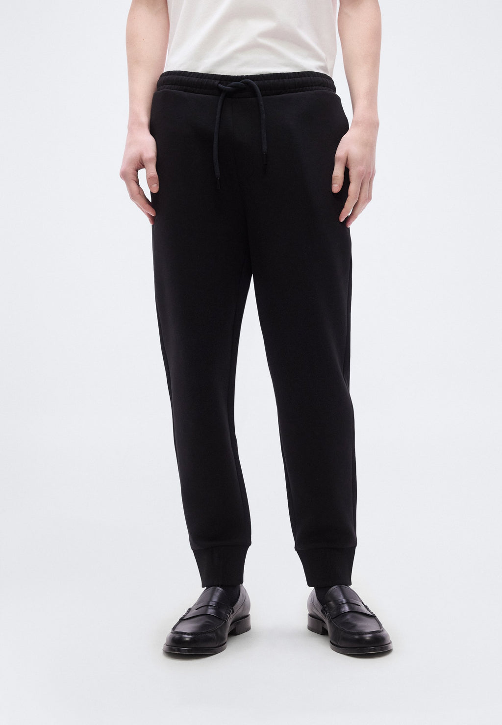 HADIKO - Tracksuit bottoms - black
