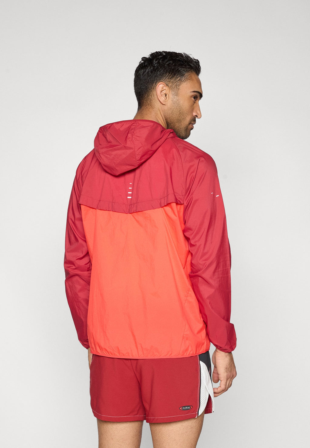 STRIDE JACKET - Windbreaker - team crimson/crimson/reflective silver-coloured
