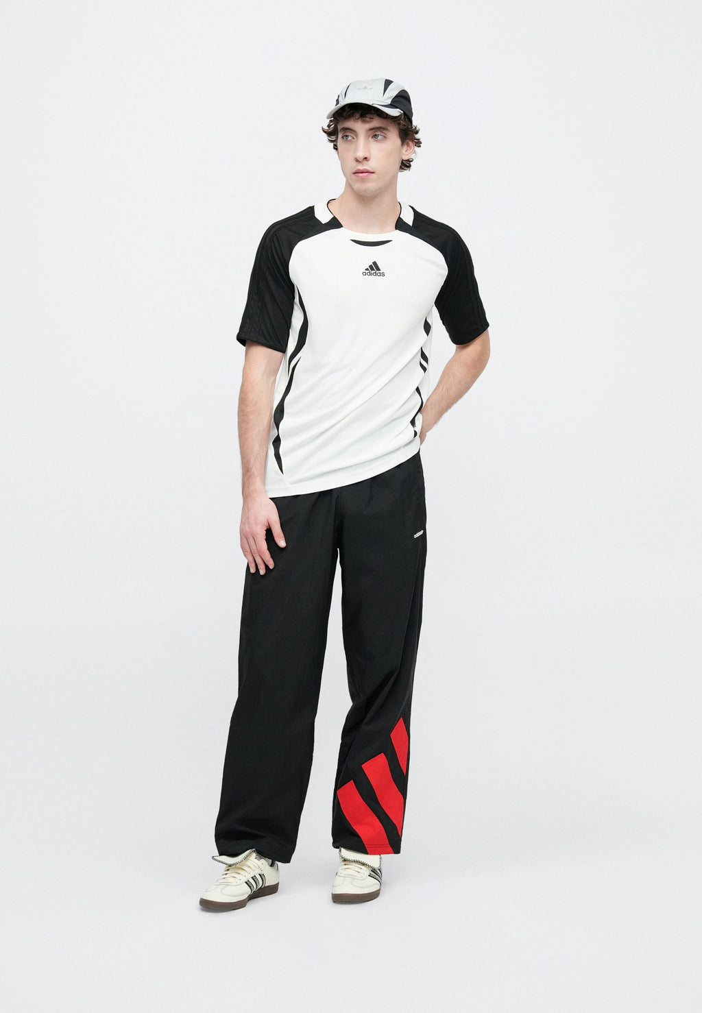 ARCH TRACK PANT UNISEX - Tracksuit bottoms - black/better scarlet