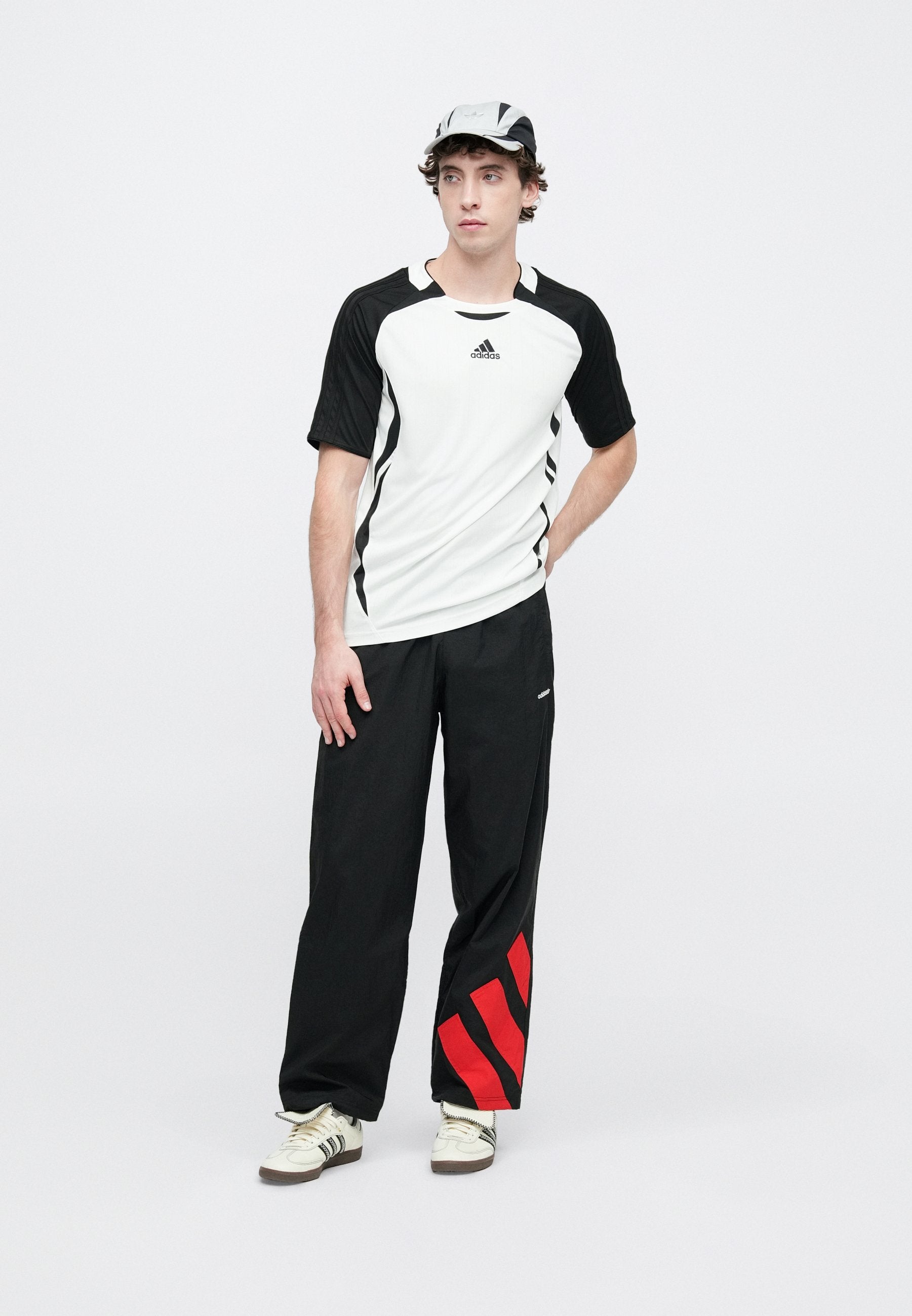 ARCH TRACK PANT UNISEX - Tracksuit bottoms - black/better scarlet