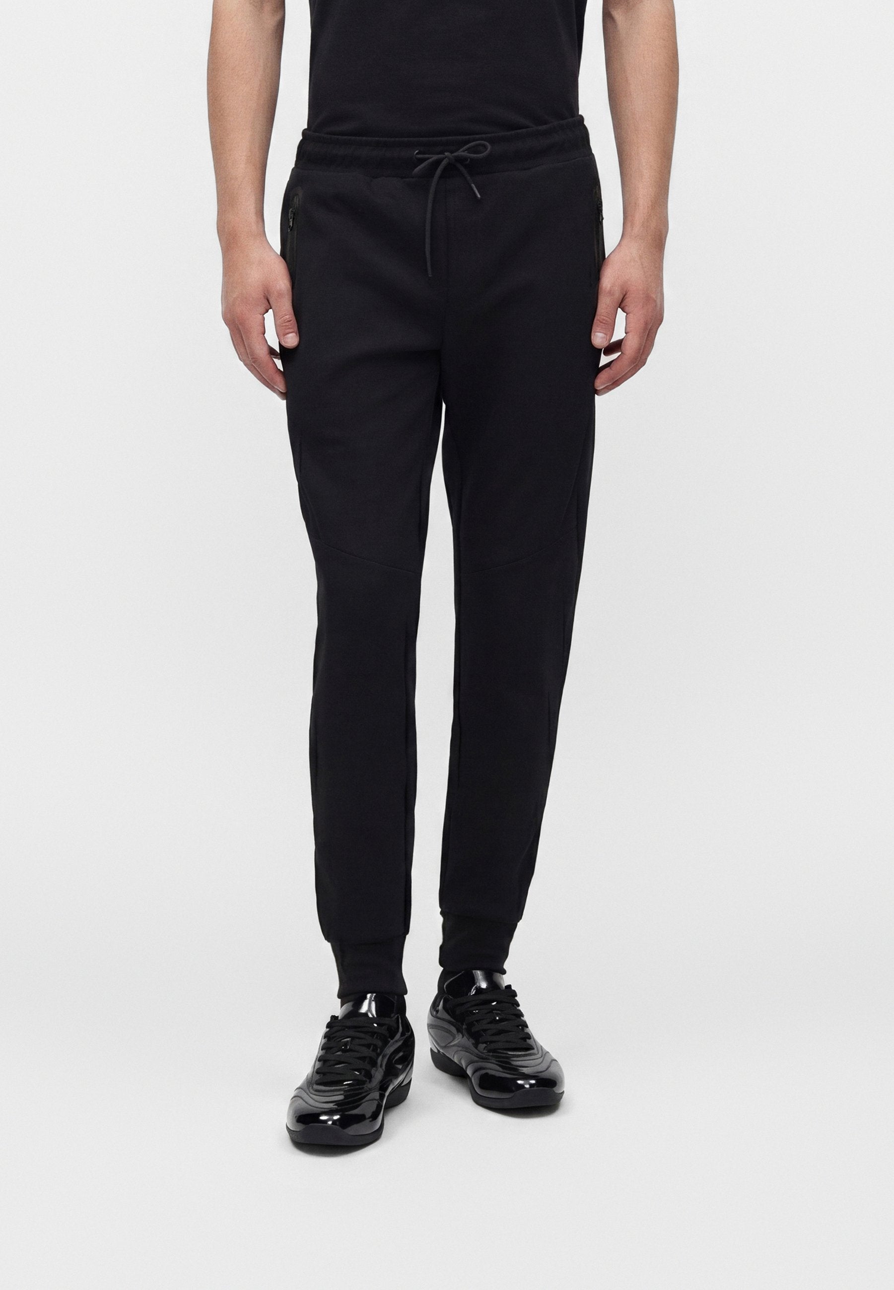 Slim Fit - Tracksuit bottoms - black