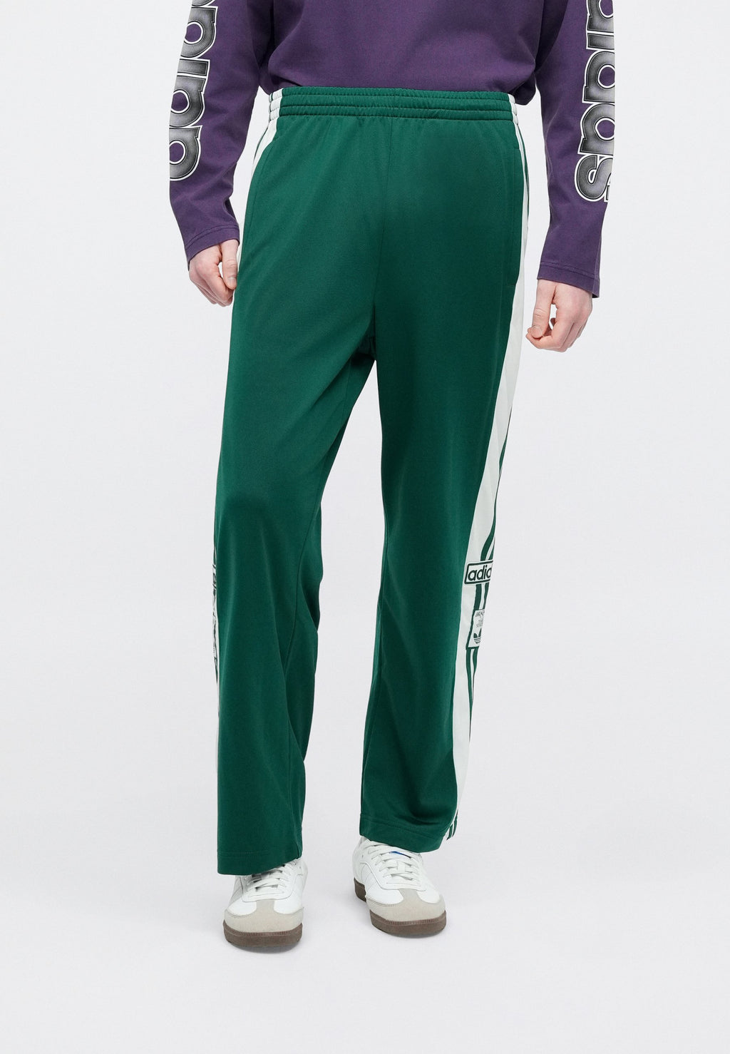 ADIBREAK UNISEX - Tracksuit bottoms - collegiate green