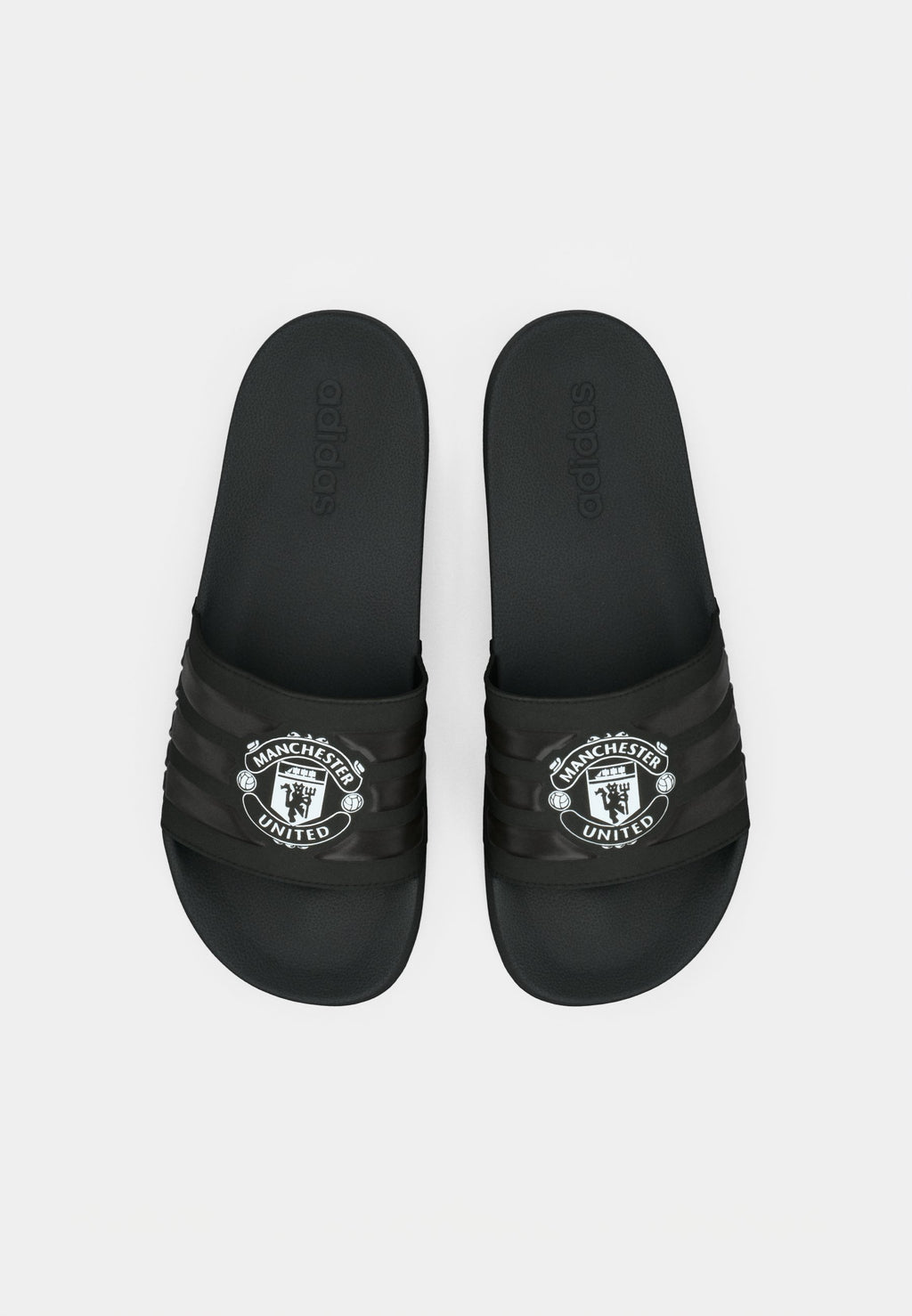 ADILETTE MANCHESTER UNITED UNISEX - Pool slides - core black