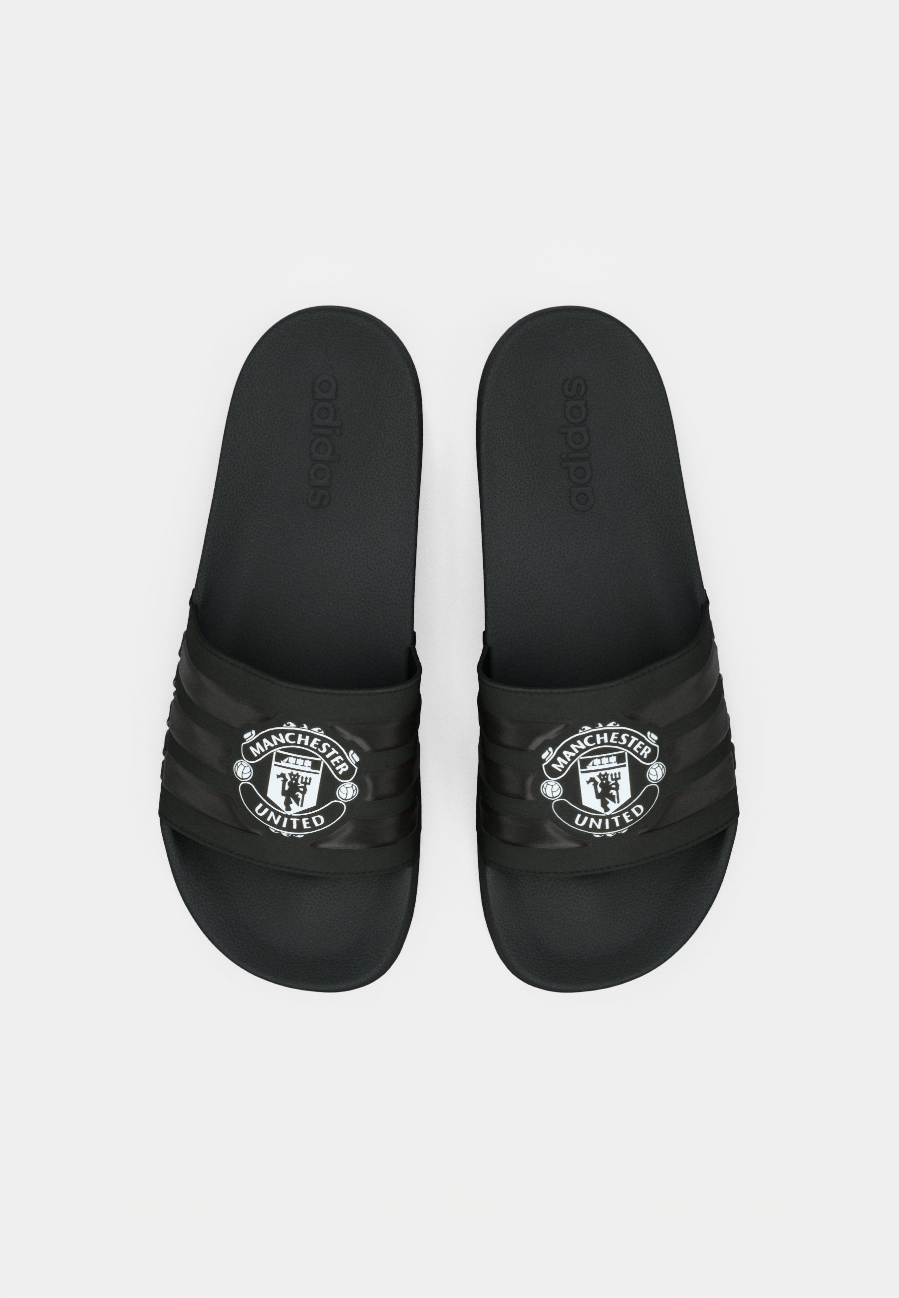 ADILETTE MANCHESTER UNITED UNISEX - Pool slides - core black