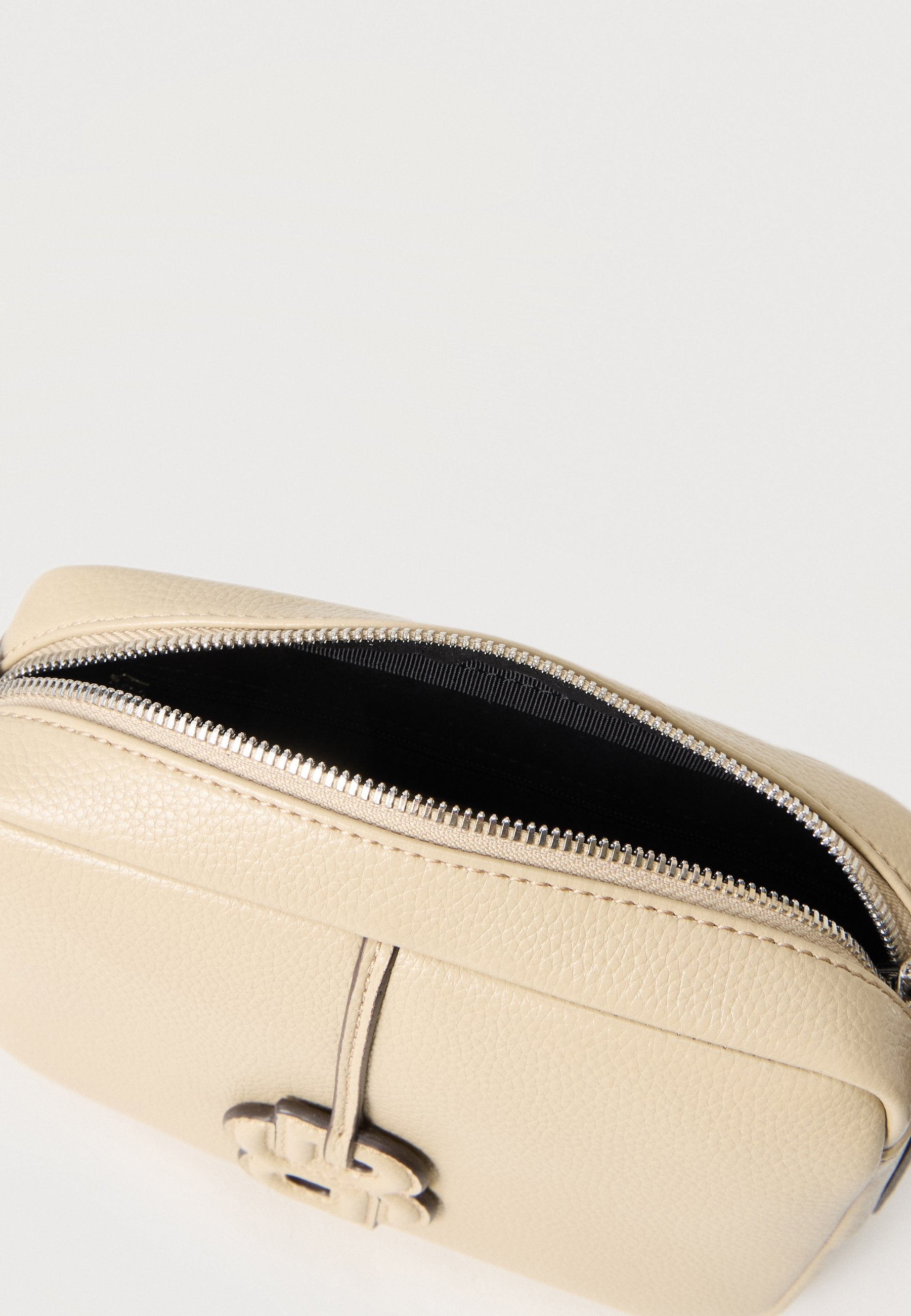 ANETT - Cross body bag - light beige