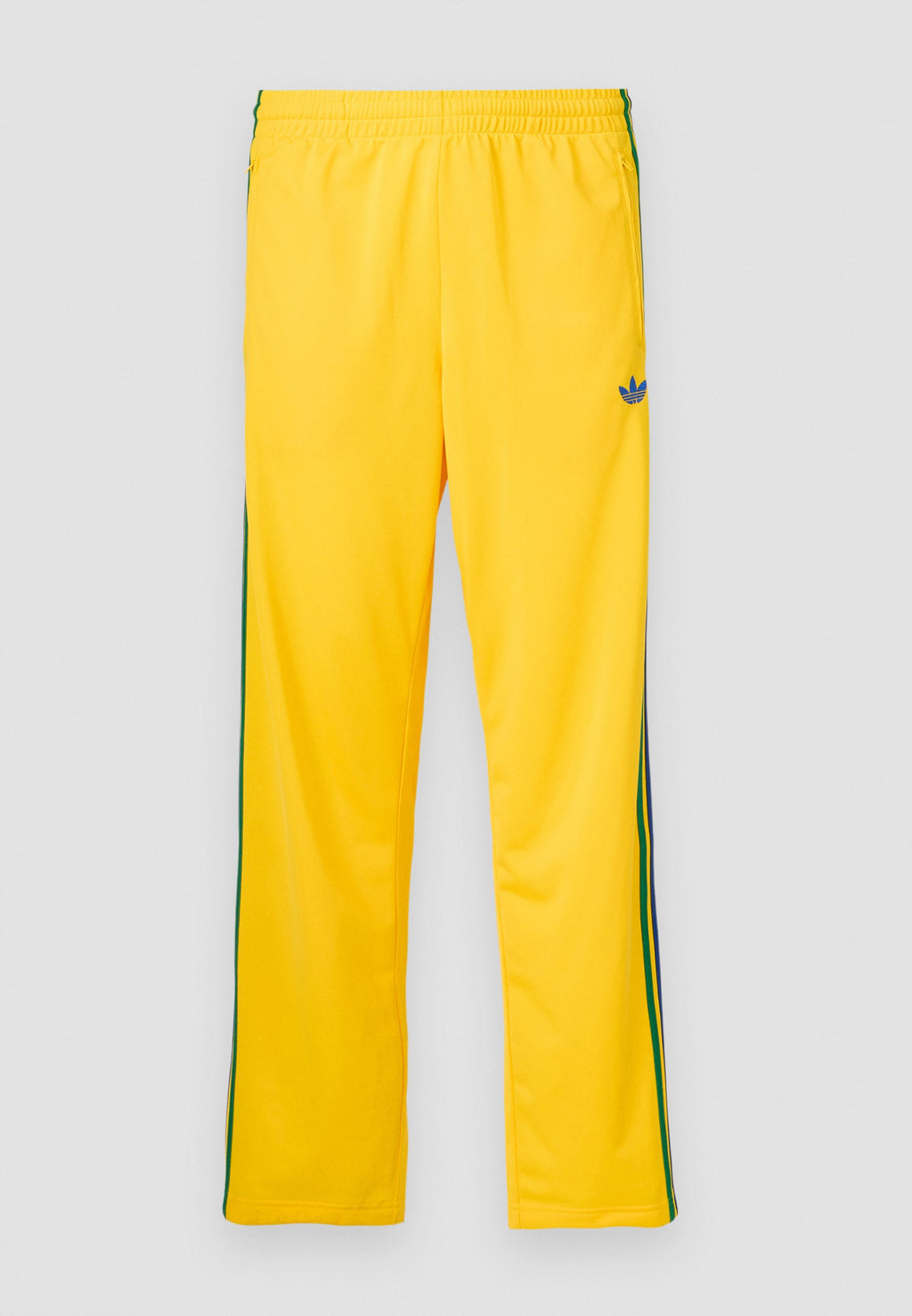 FIREBIRD TP - Tracksuit bottoms - yellow