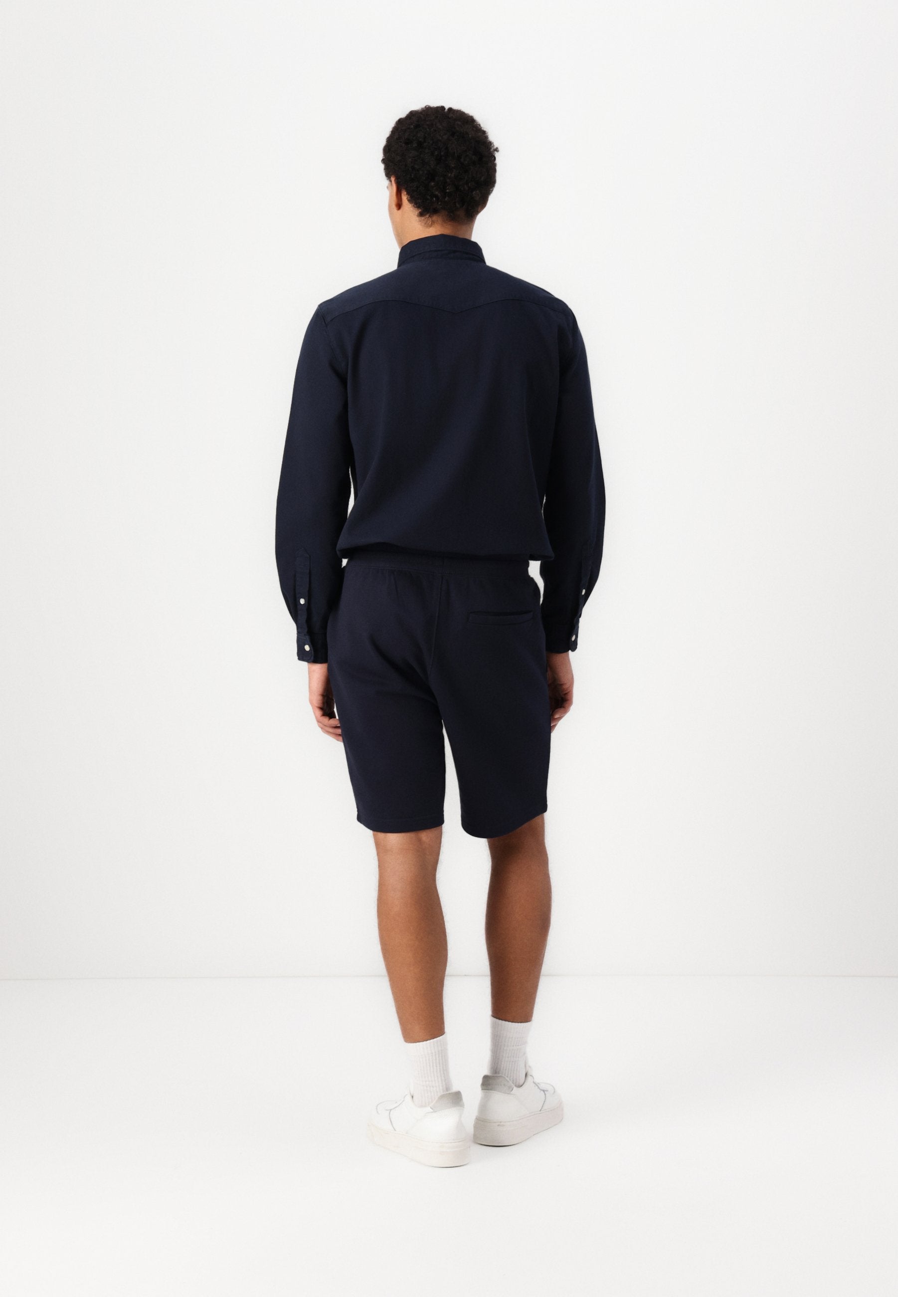 ESSENTIAL - Tracksuit bottoms - desert sky