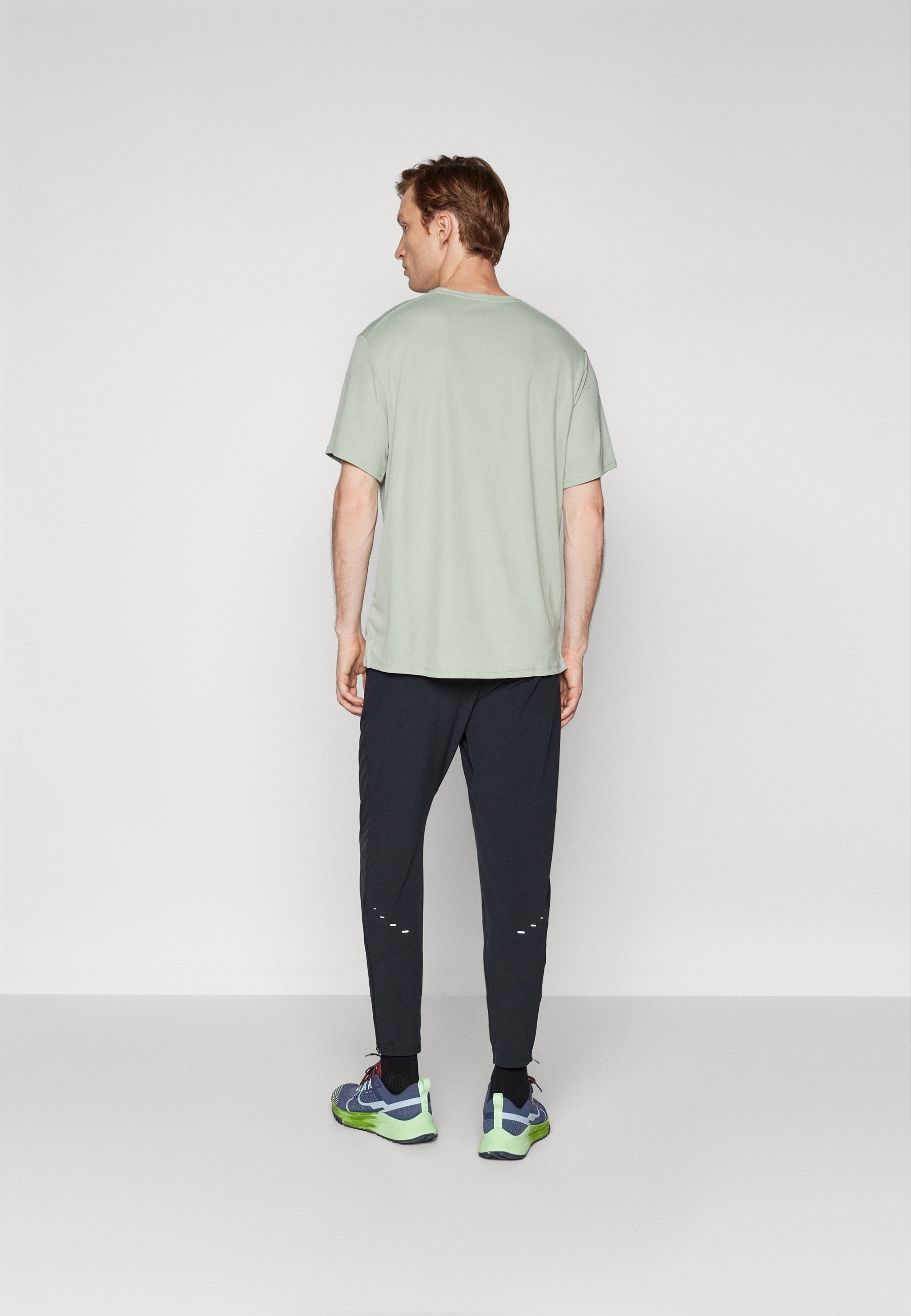 Tracksuit bottoms - black/reflective silver