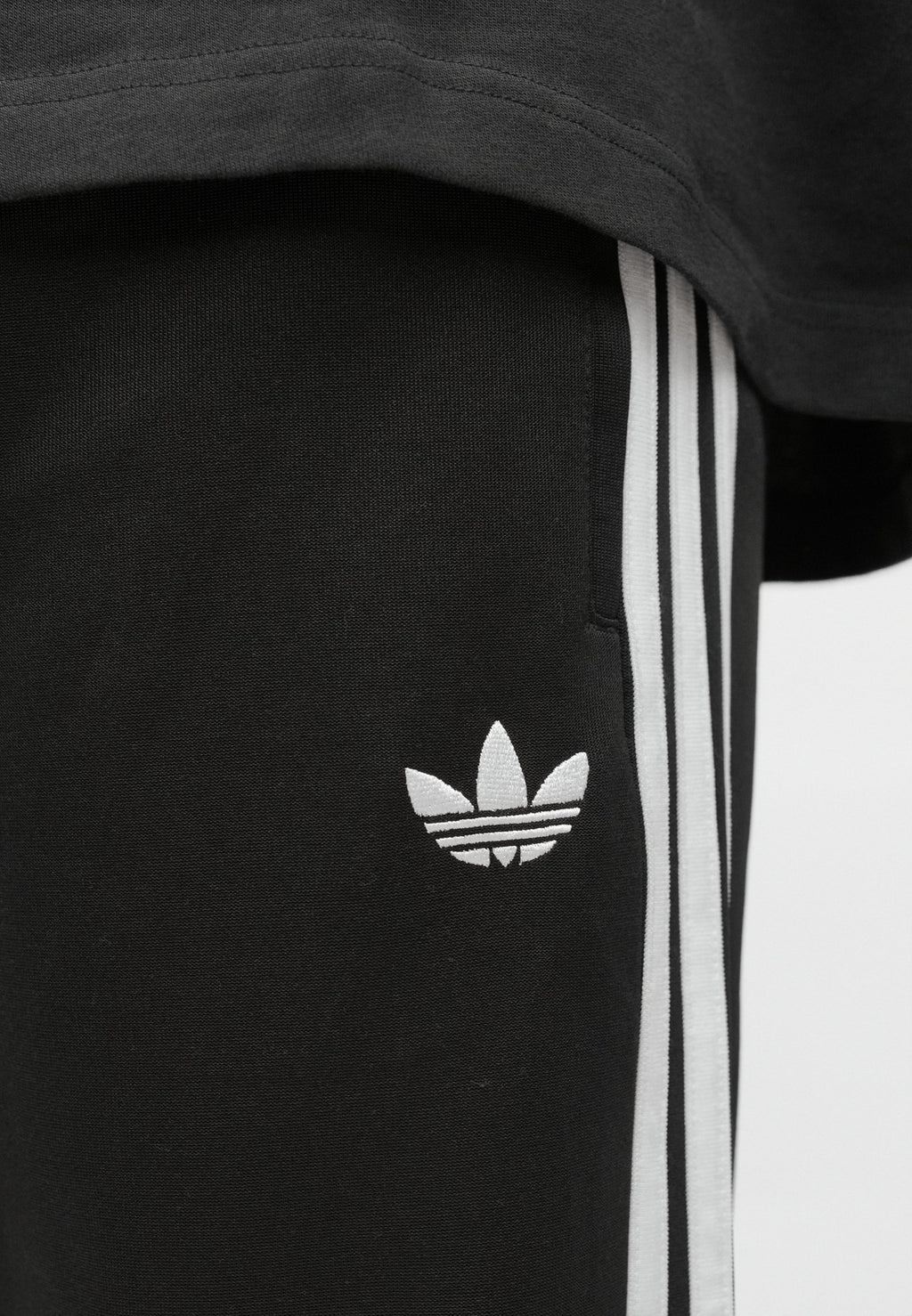 SST TP - Tracksuit bottoms - black