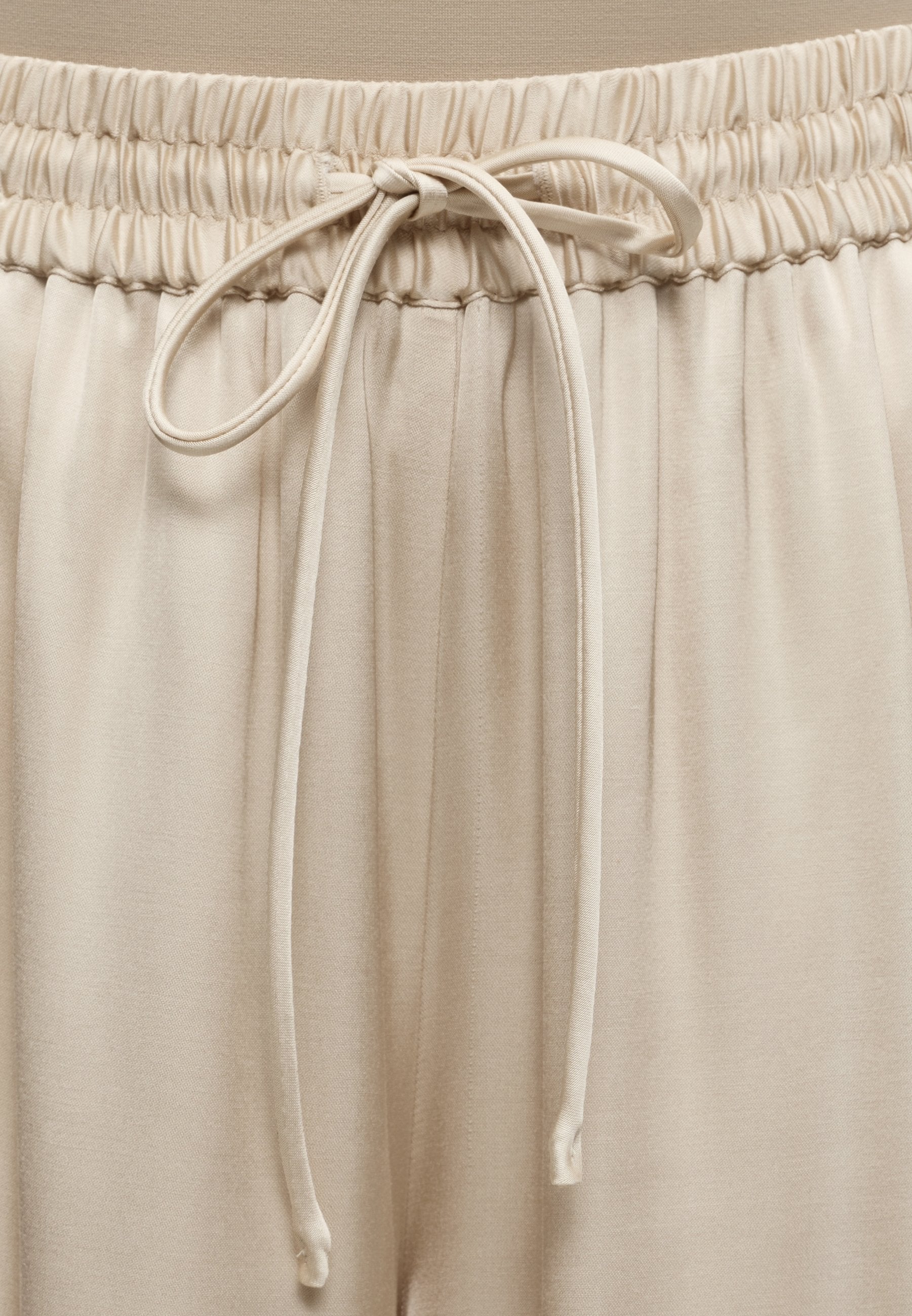 TALIA - Trousers - open beige