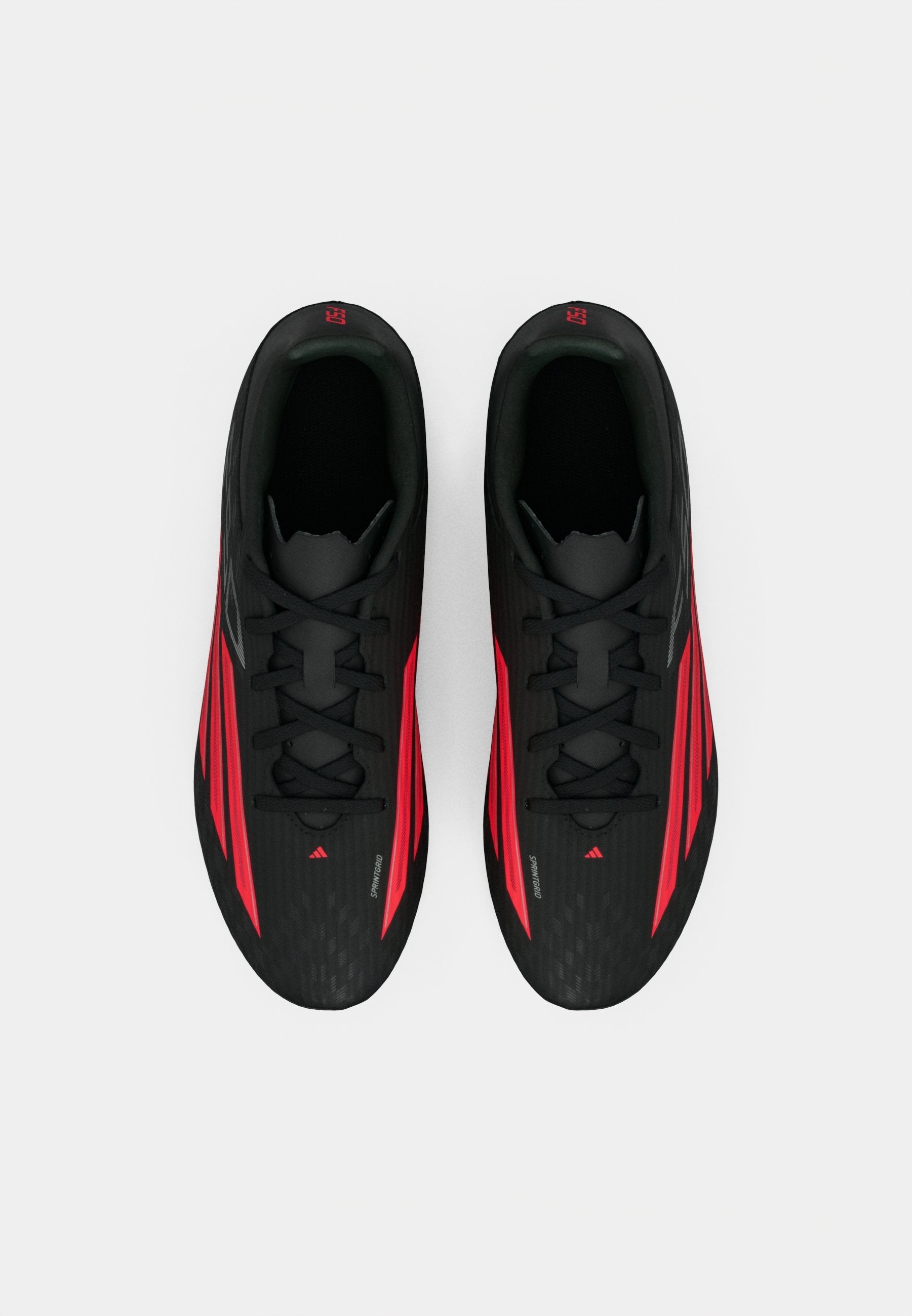 F50 CLUB MULTI - Crampons de foot sur terrain synthétique - core black/lucid red