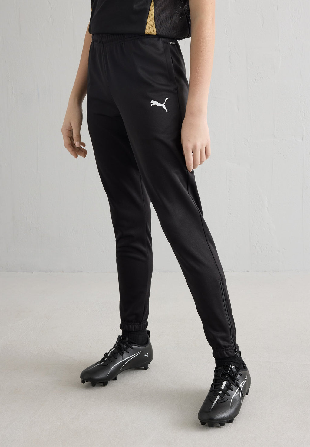 TEAMRISE POLY TRAINING UNISEX - Tracksuit bottoms - black/white