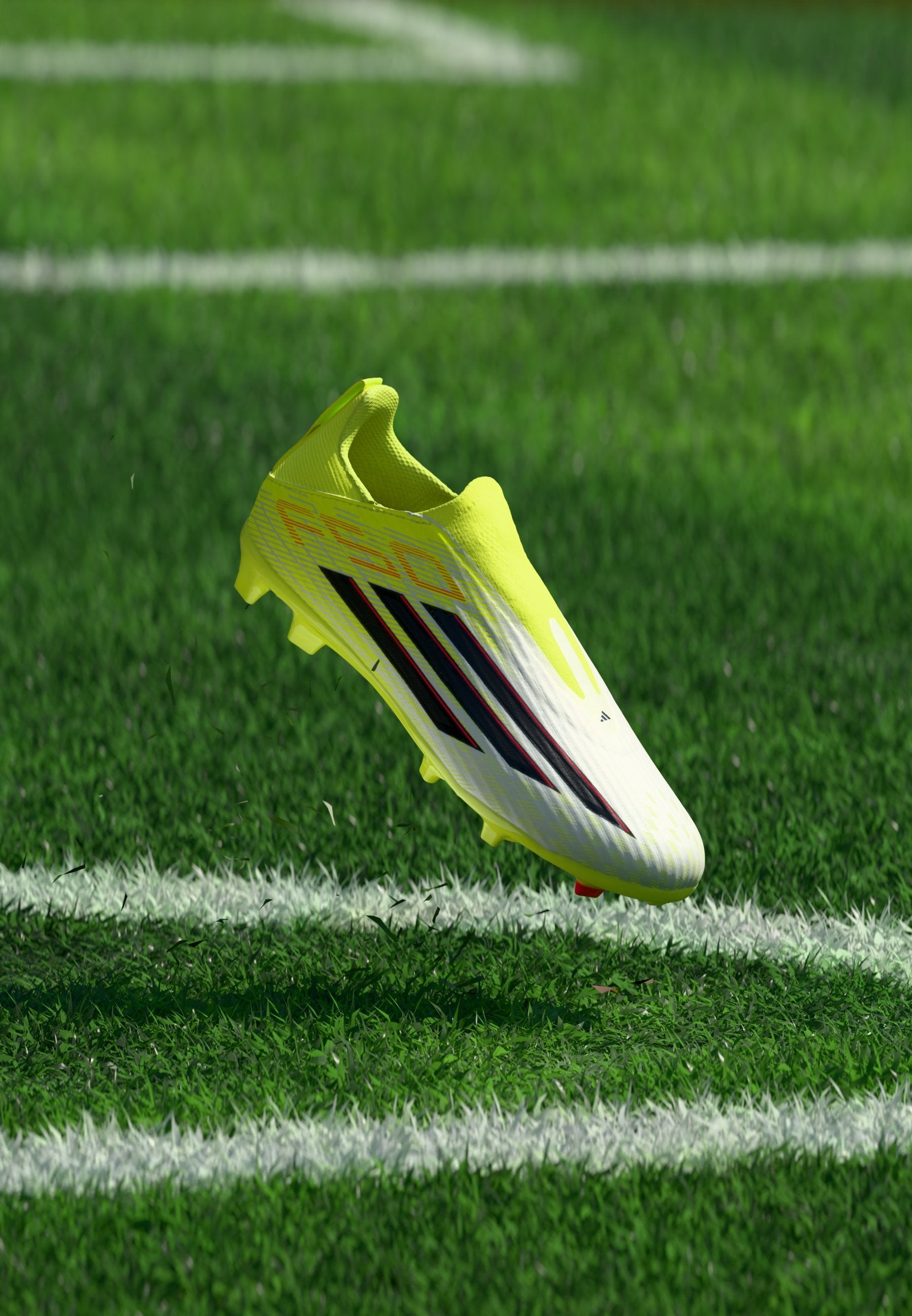 F50 LEAGUE LACELESS FIRM GROUND / MULTI GROUND KIDS UNISEX - Football boots artificial grass - team solar yellow 2/core black/lucid red