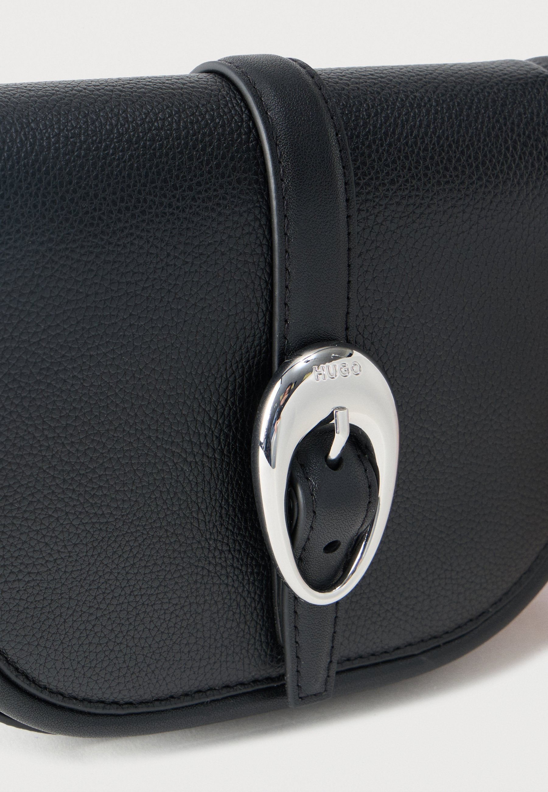 JAINA SADDLE - Cross body bag - black