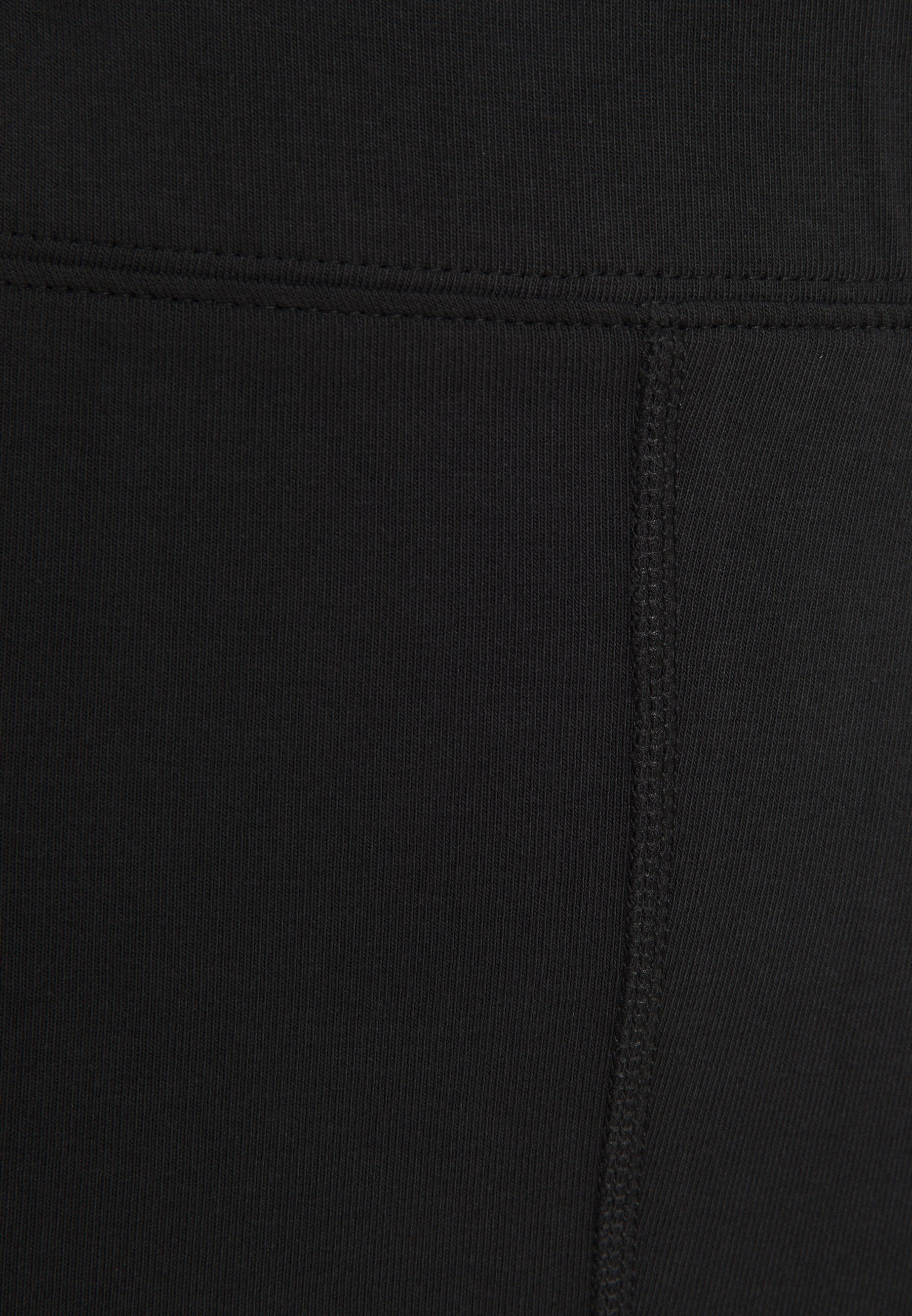 PLUS - Leggings - Trousers - black