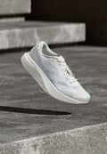 ADIZERO EVO SL M - Trainers - footwear white/warm sandstone