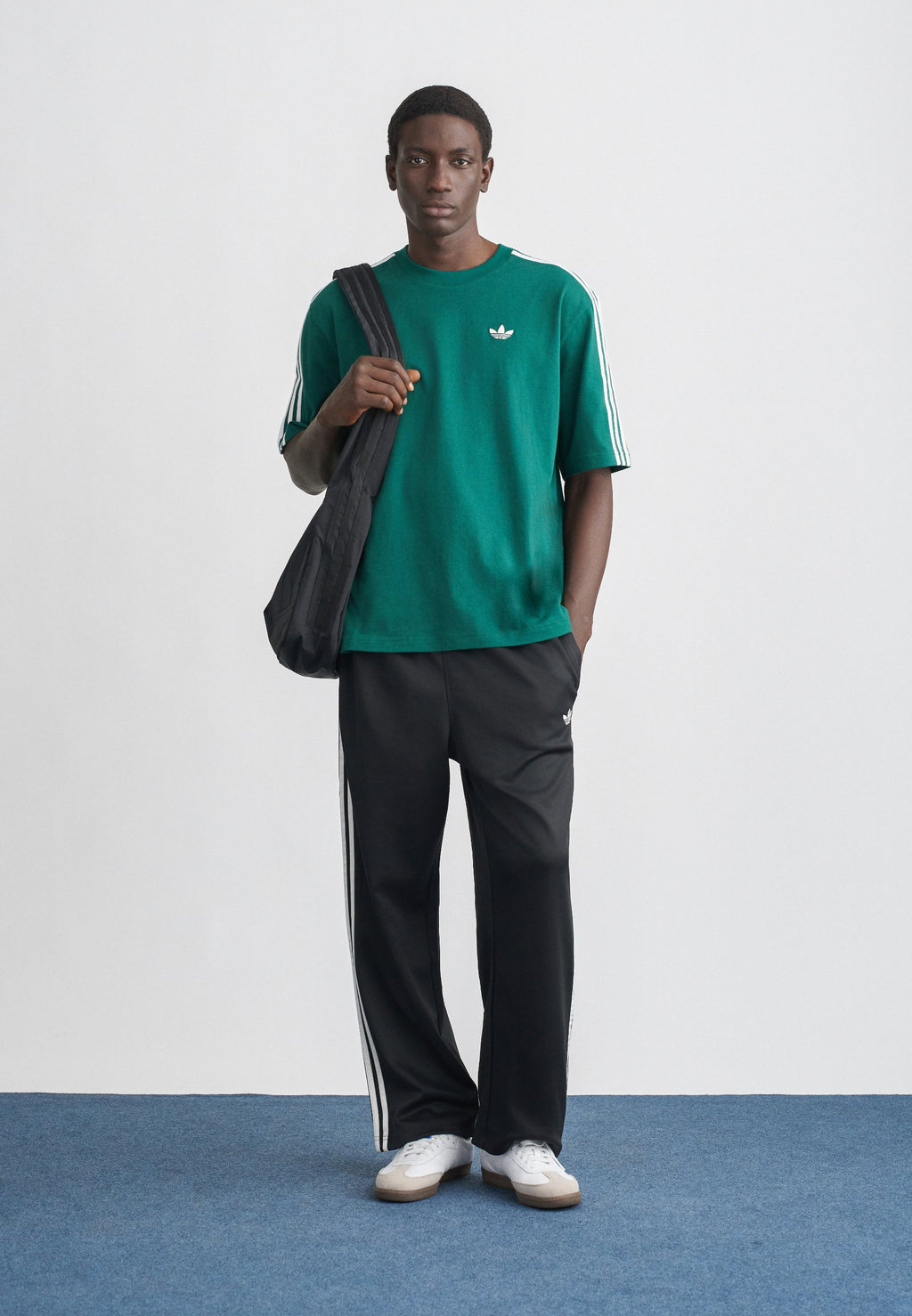 LOOSE  - Tracksuit bottoms - black/white